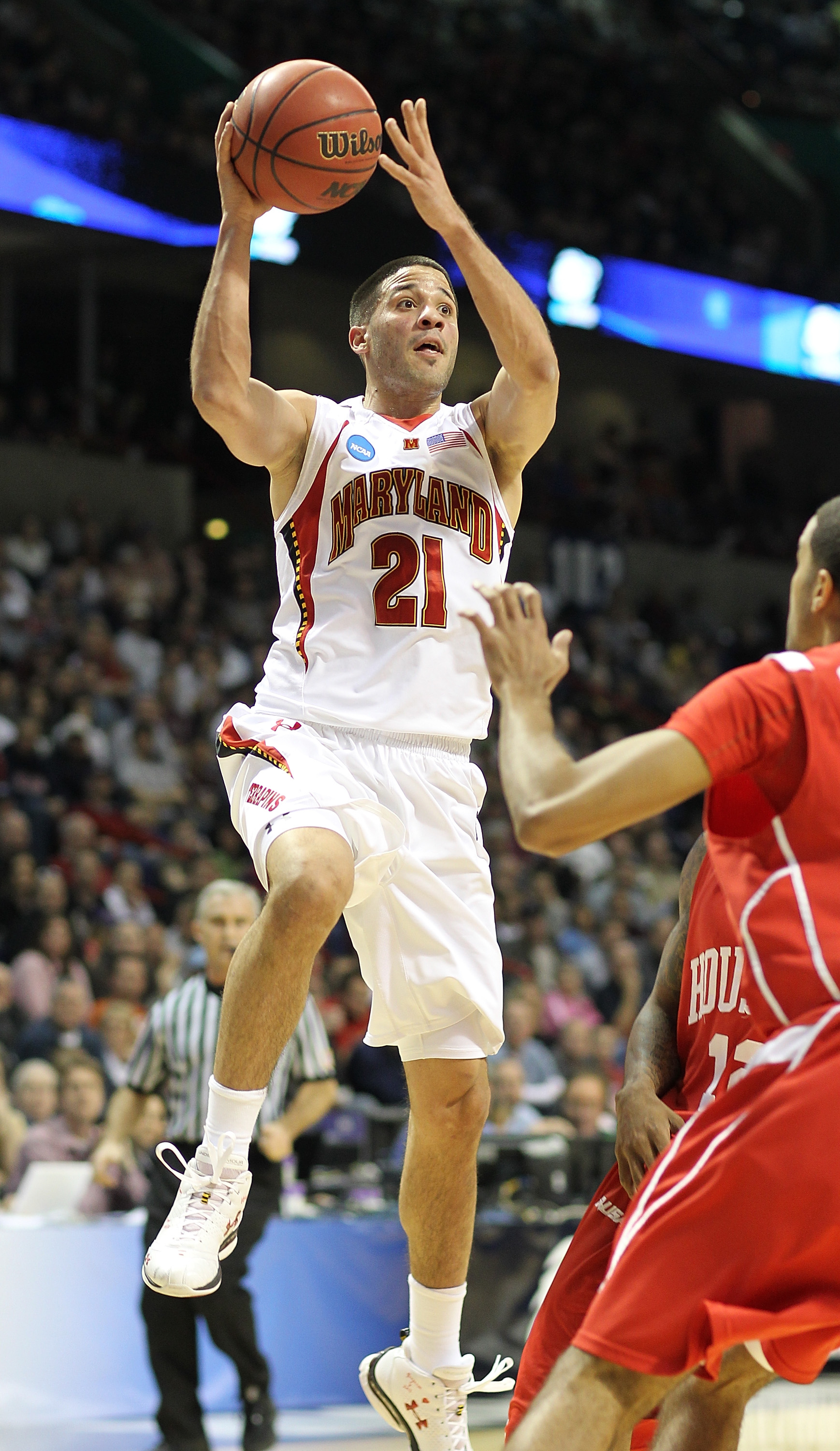 SPOKANE - MARCH 19:  Greivis Vasquez #21 of the Maryland Terrapins passes against the Houston Cougars during the first round of the 2010 NCAA men's basketball tournament at the Spokane Arena on March 19, 2010 in Spokane, Washington. (Photo by Otto Greule