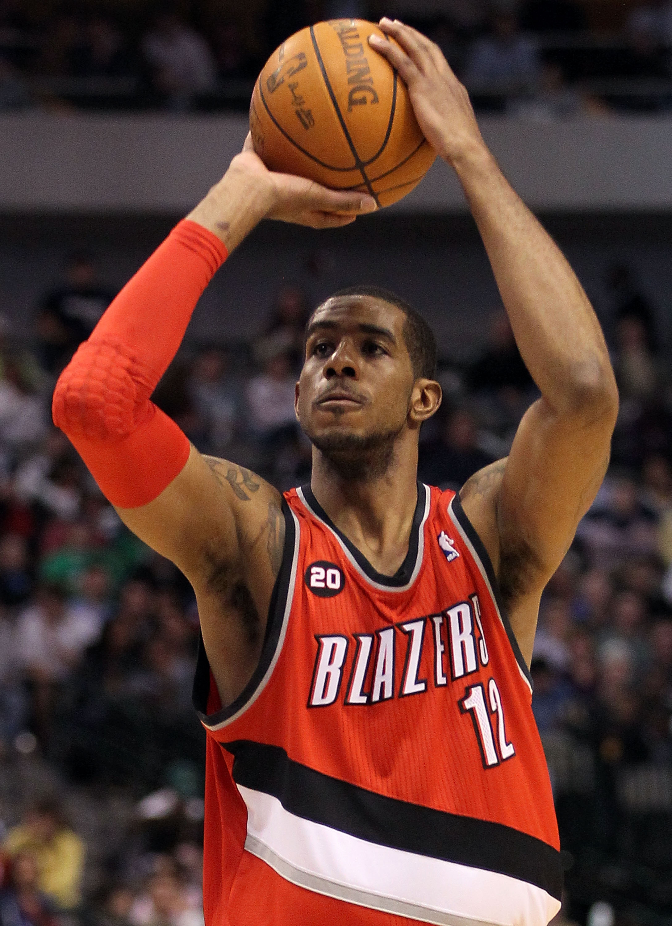 DALLAS, TX - DECEMBER 15:  LaMarcus Aldridge #12 of the Portland Trail Blazers at American Airlines Center on December 15, 2010 in Dallas, Texas. NOTE TO USER: User expressly acknowledges and agrees that, by downloading and or using this photograph, User