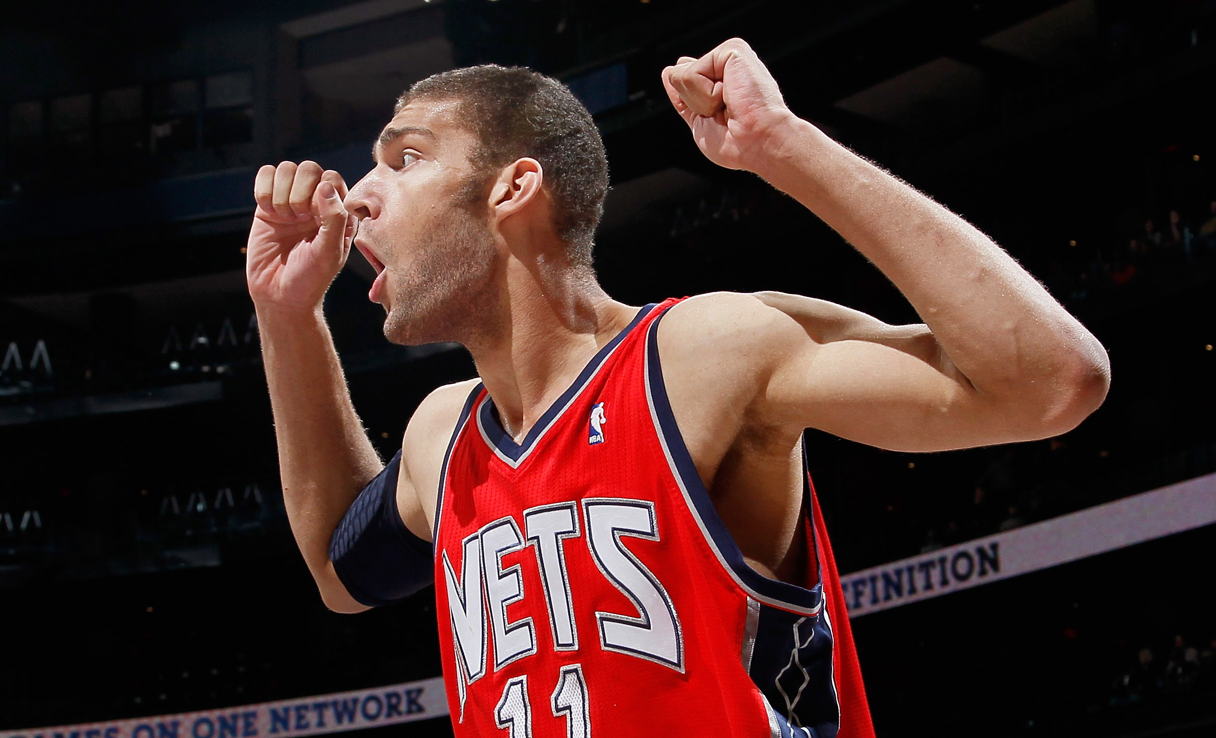 ATLANTA, GA - DECEMBER 07:   Brook Lopez #11 of the New Jersey Nets reacts after being called for a foul against the Atlanta Hawks at Philips Arena on December 7, 2010 in Atlanta, Georgia.  NOTE TO USER: User expressly acknowledges and agrees that, by dow