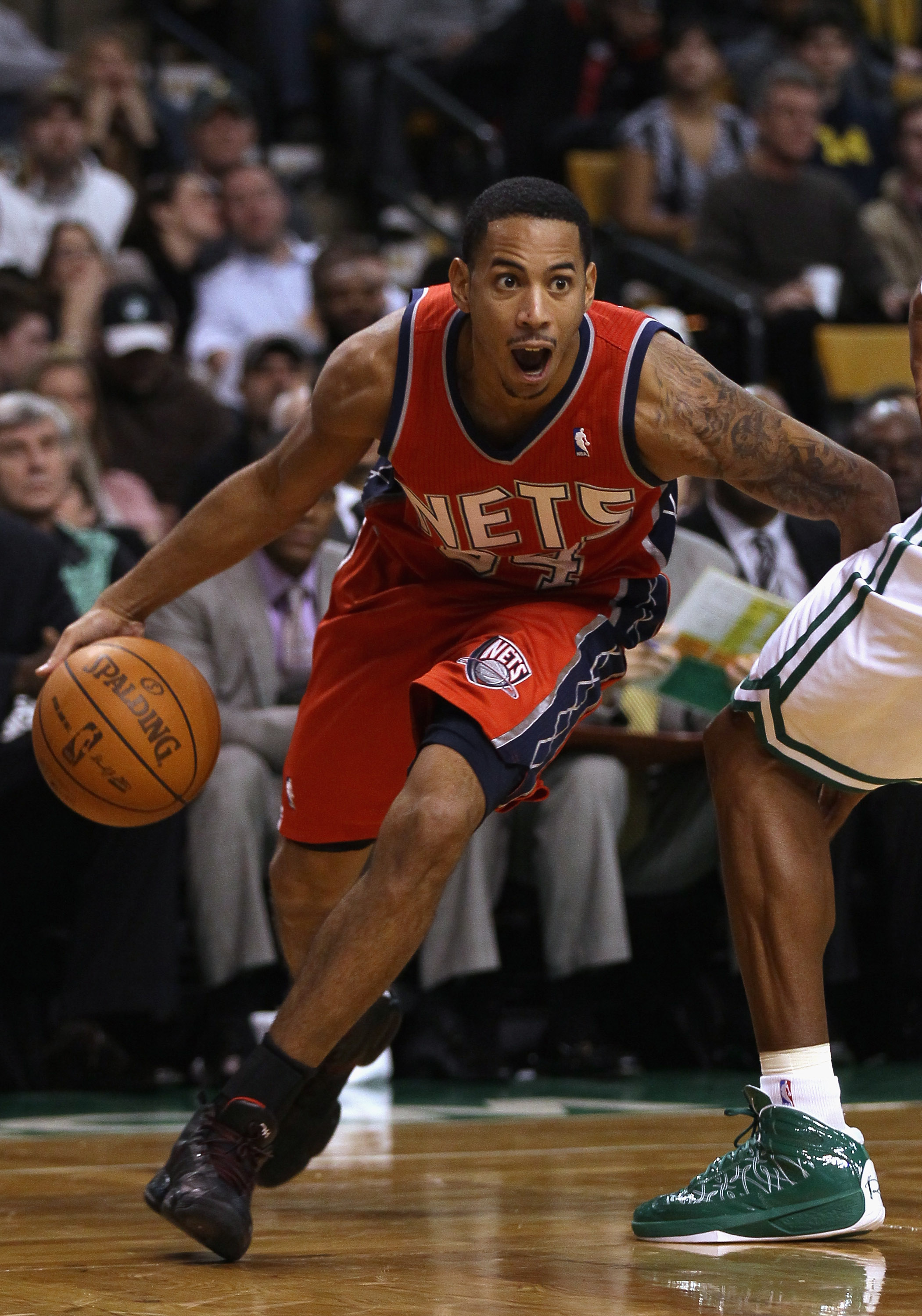 BOSTON - NOVEMBER 24:  Devin Harris #34 of the New Jersey Nets drives to the basket in the second half against the Boston Celtics on November 24, 2010 at the TD Garden in Boston, Massachusetts. The Celtics defeated the nets 89-83. NOTE TO USER: User expre