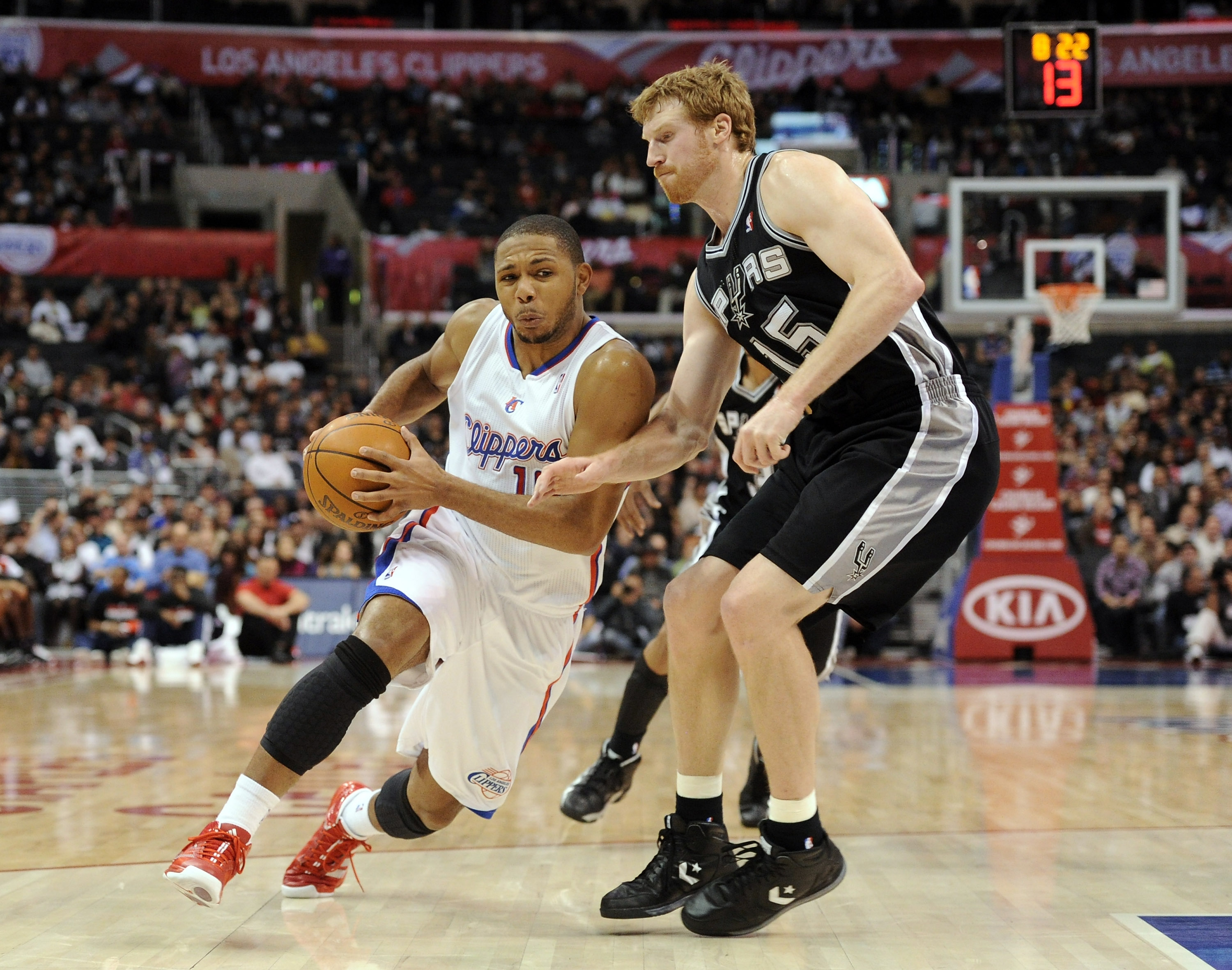 LOS ANGELES, CA - DECEMBER 01:  Eric Gordon #10 of the Los Angeles Clippers drives around Matt Bonner #15 of the San Antonio Spurs during the game at the Staples Center on December 1, 2010 in Los Angeles, California.  NOTE TO USER: User expressly acknowle