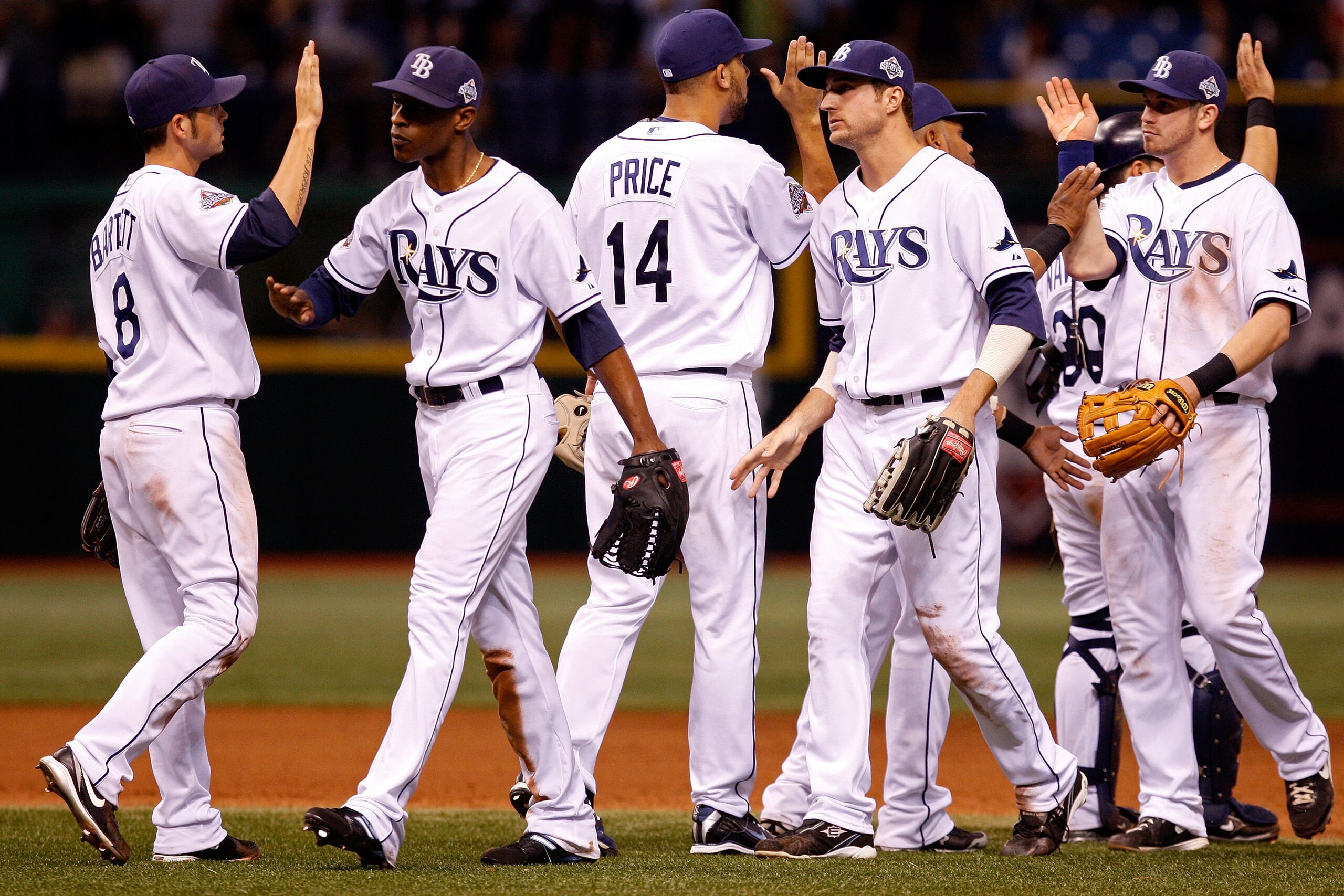 ST PETERSBURG, FL - OCTOBER 23:  (L-R) Jason Bartlett #8, B.J. Upton #2, David Price #14, Rocco Baldelli #5 and Evan Longoria #3 of the Tampa Bay Rays celebrate their 4-2 win against the Philadelphia Phillies during game two of the 2008 MLB World Series o