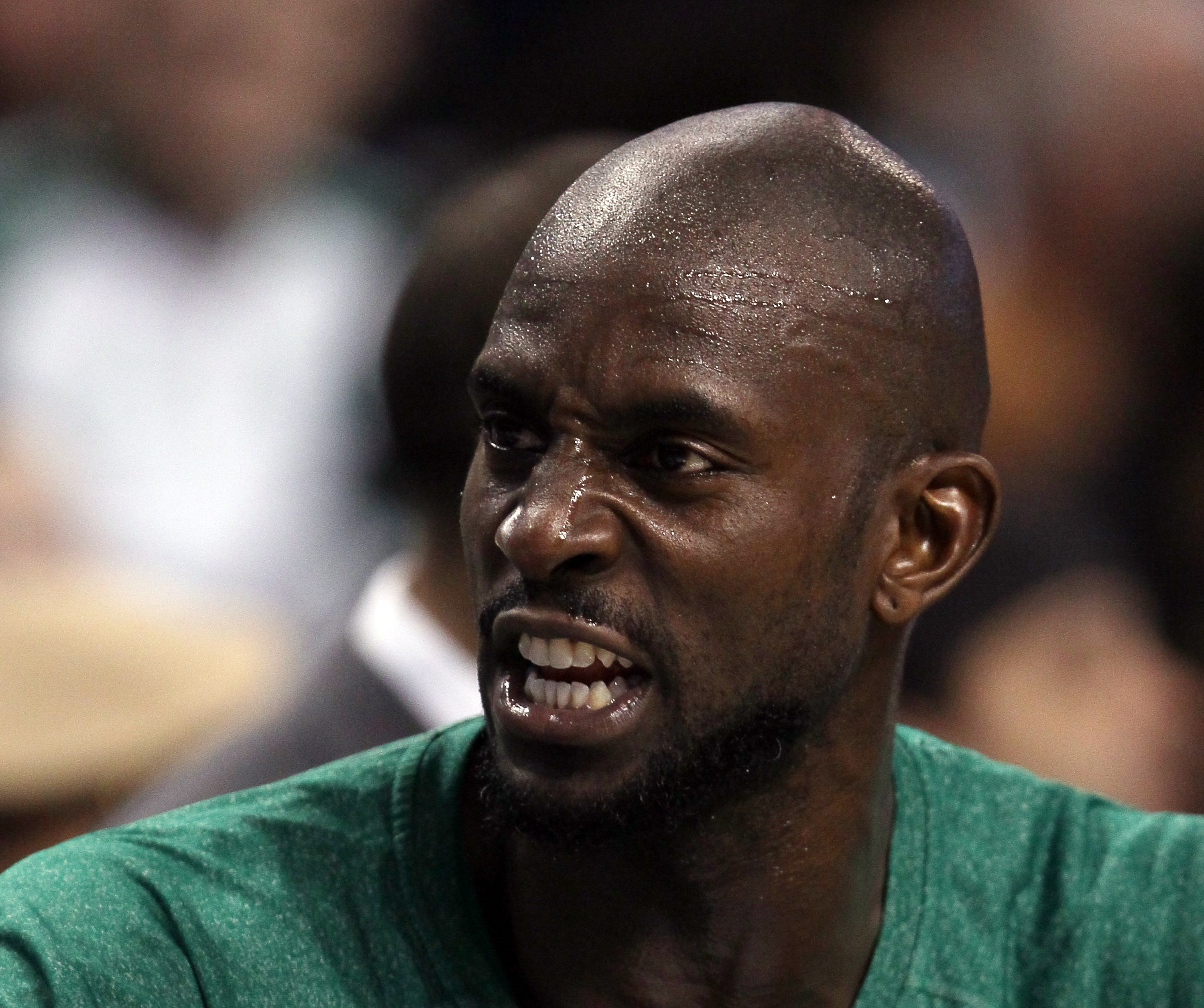 BOSTON, MA - DECEMBER 16:  Kevin Garnett #5 of the Boston Celtics talks on the bench in the first half against the Atlanta Hawks on December 16, 2010 at the TD Garden in Boston, Massachusetts. NOTE TO USER: User expressly acknowledges and agrees that, by