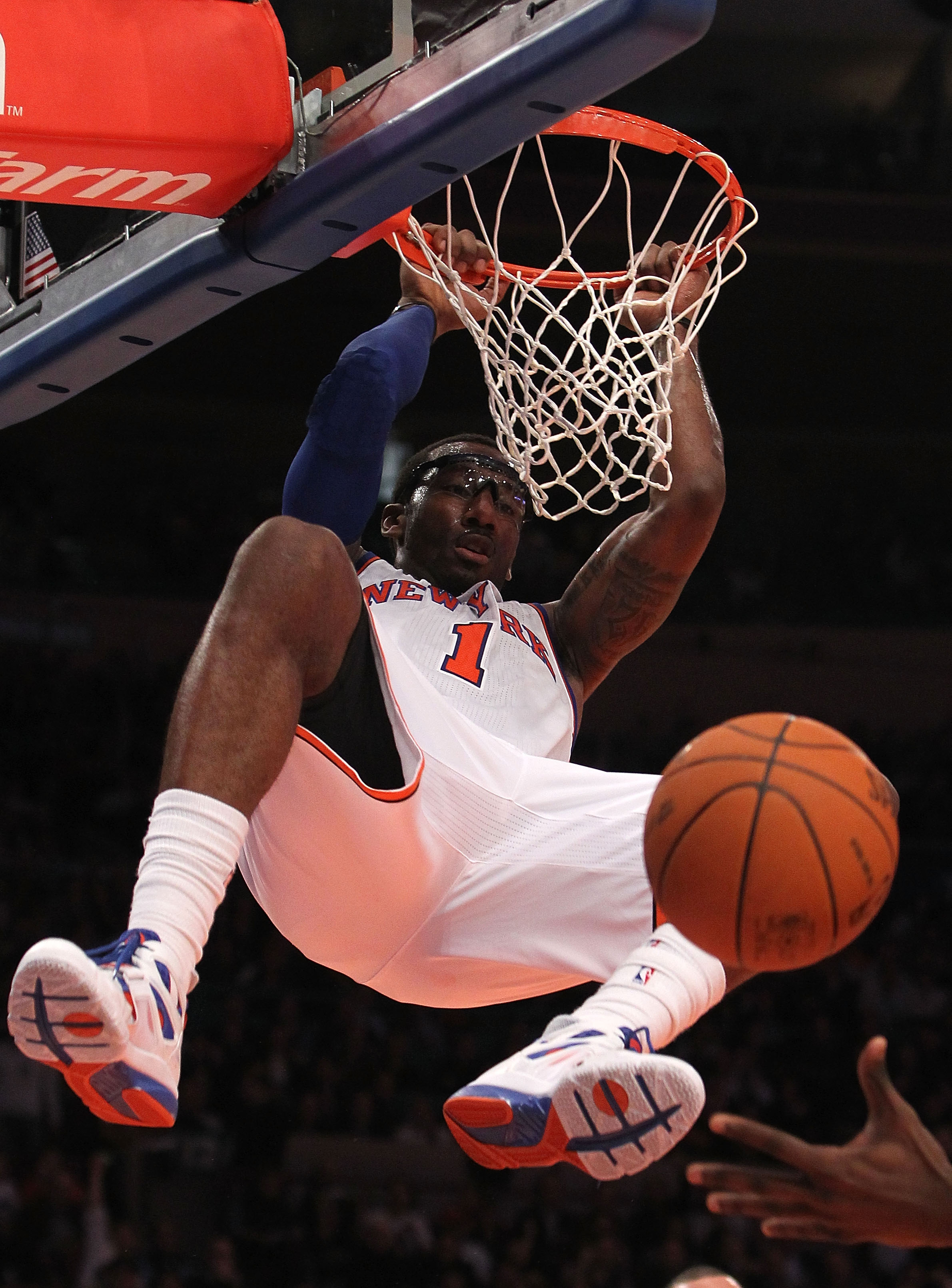 NEW YORK, NY - NOVEMBER 30: Amar'e Stoudemire #1 of the New York Knicks dunks the ball against the New Jersey Nets on November 30, 2010 at Madison Square Garden in New York City. NOTE TO USER: User expressly acknowledges and agrees that, by downloading an