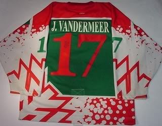 Minor-league team sports festive jerseys for Christmas in July