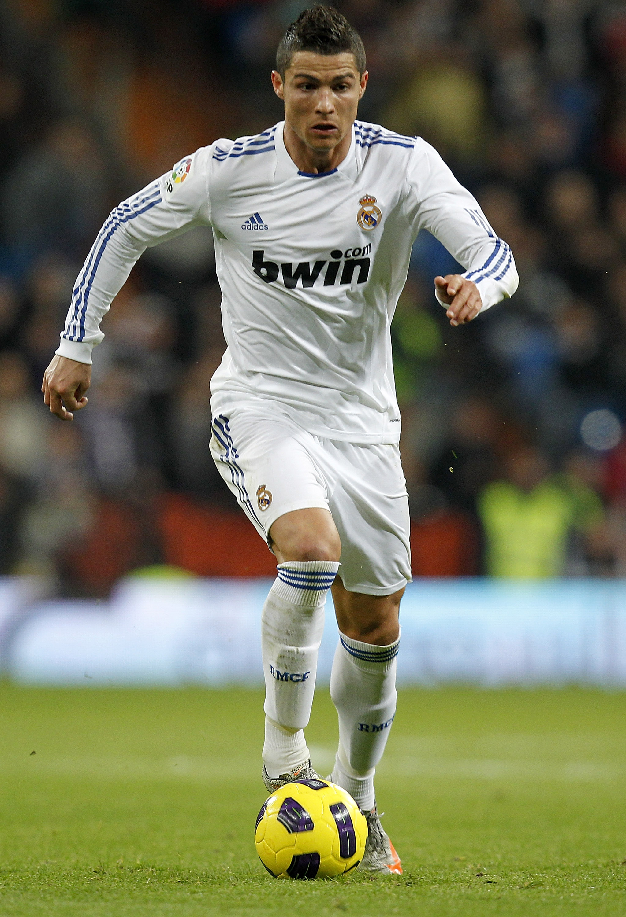 MADRID, SPAIN - DECEMBER 19:  Cristiano Ronaldo of Real Madrid in action during the La Liga match between Real Madrid and Sevilla at Estadio Santiago Bernabeu on December 19, 2010 in Madrid, Spain. Real Madrid won the match 1-0.  (Photo by Angel Martinez/