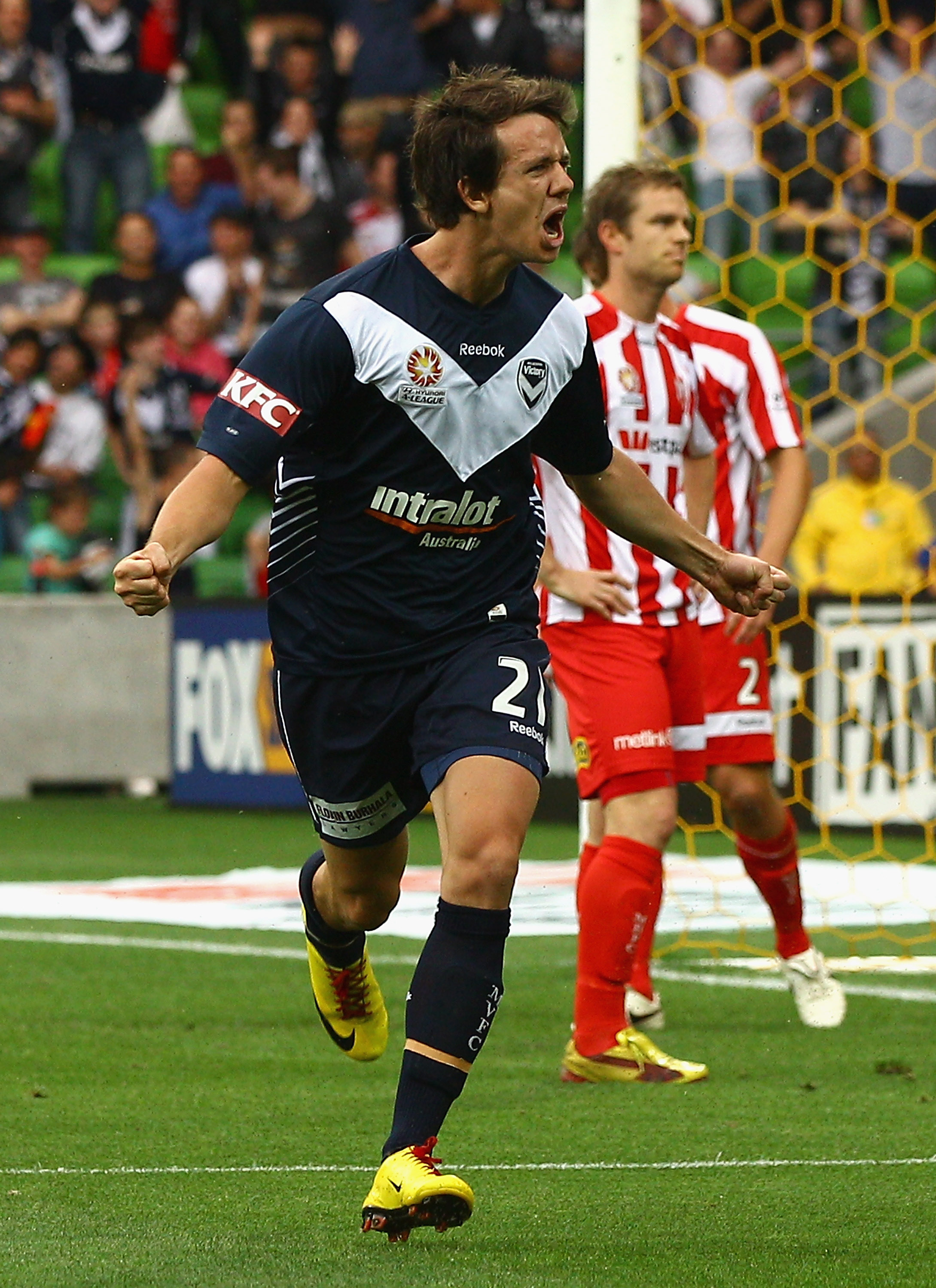 MELBOURNE, AUSTRALIA - DECEMBER 11:  Robbie Kruse of the Victory celebrates scoring a goal during the round 18 A-League match between the Melbourne Heart and Melbourne Victory at AAMI Park  on December 11, 2010 in Melbourne, Australia.  (Photo by Quinn Ro