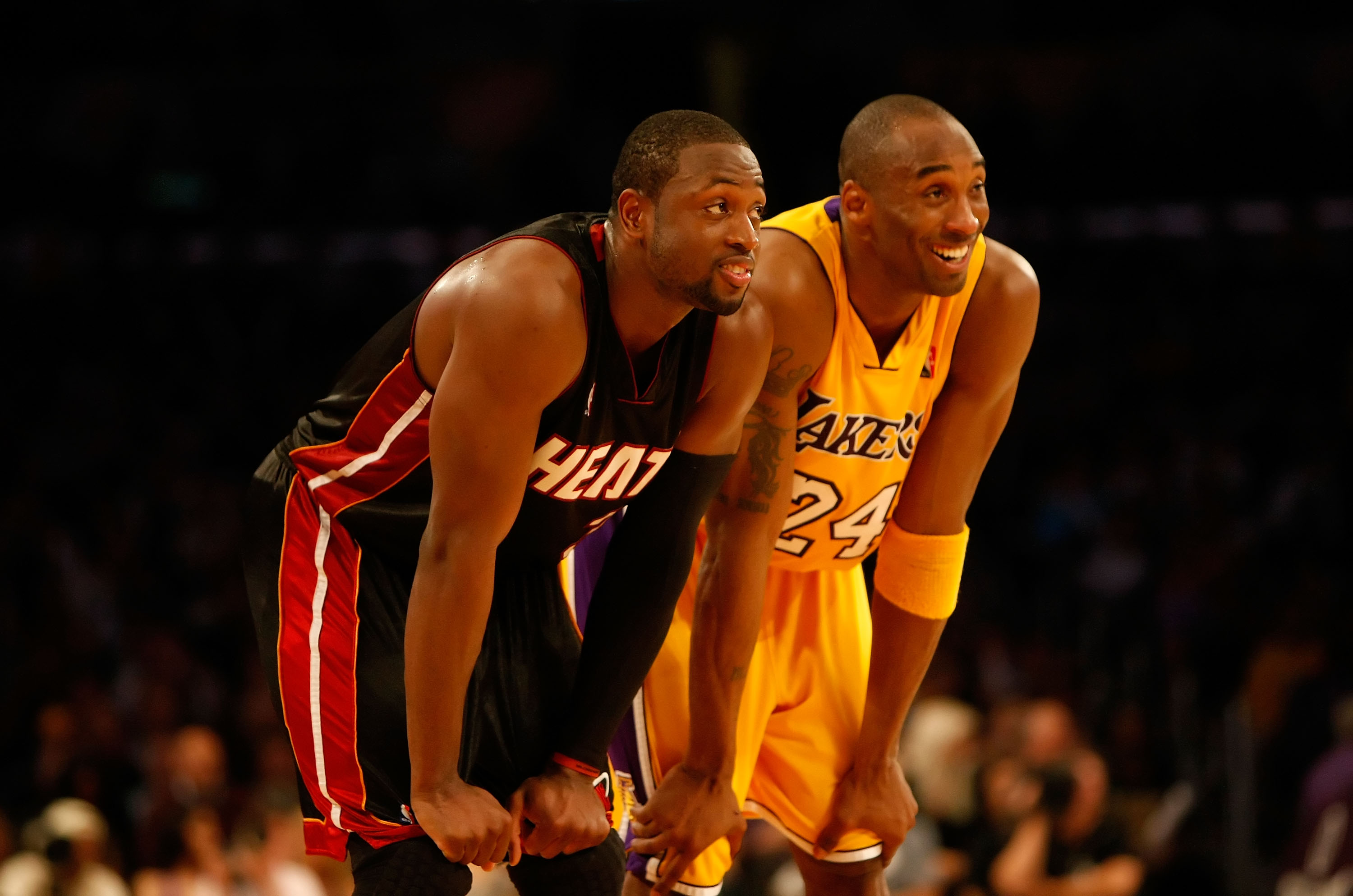 LOS ANGELES, CA - DECEMBER 04:  Kobe Bryant #24 of the Los Angeles Lakers and Dwayne Wade #3 of the Miami Heat share a laugh in the fourth quarter at Staples Center on December 4, 2009 in Los Angeles, California. The Lakers defeated the Heat 108-107. NOTE