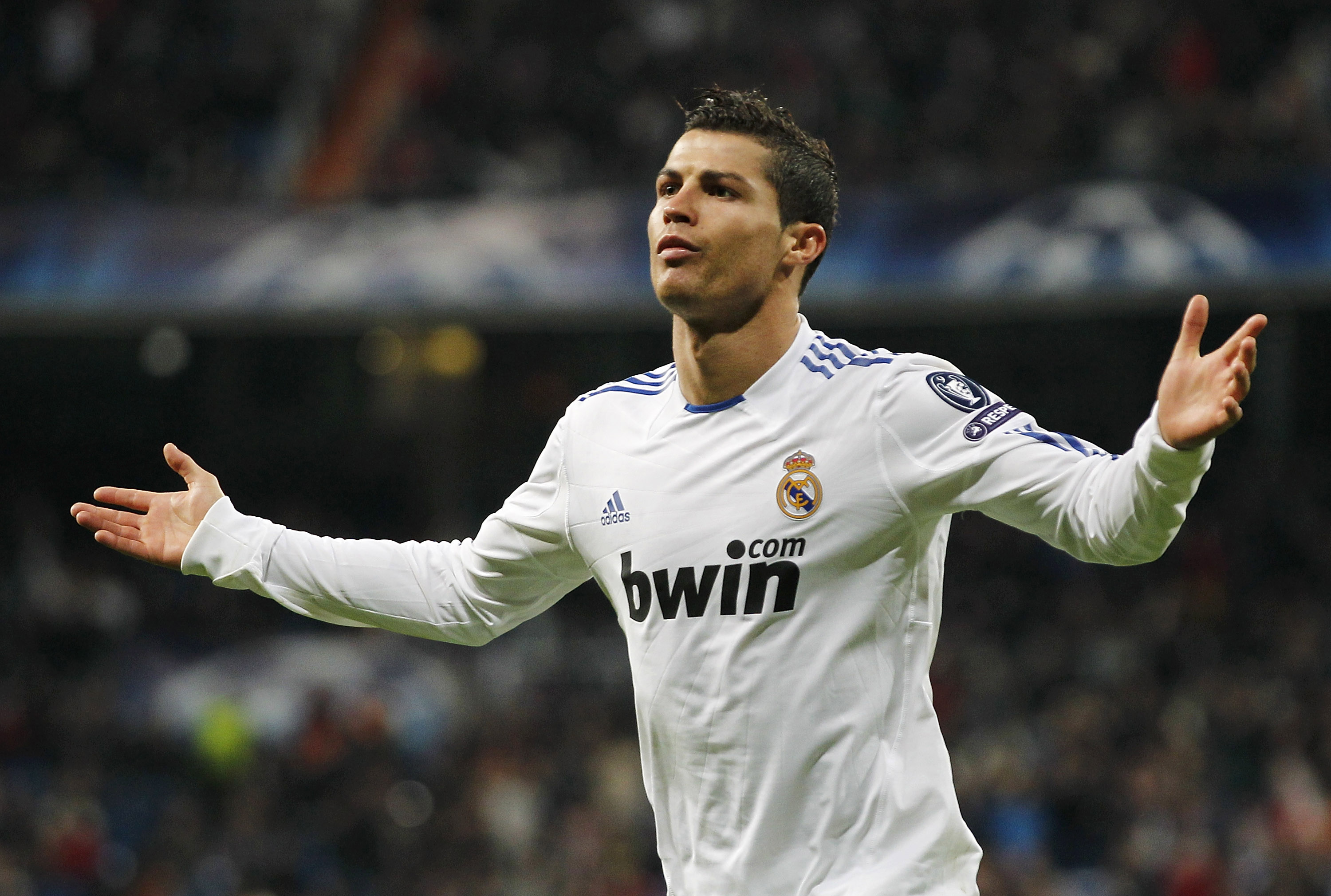 MADRID, SPAIN - DECEMBER 08:  Cristiano Ronaldo of Real Madrid celebrates after scoring Real's second goal during the Champions League group G match between Real Madrid and AJ Auxerre at Estadio Santiago Bernabeu on December 8, 2010 in Madrid, Spain.  (Ph