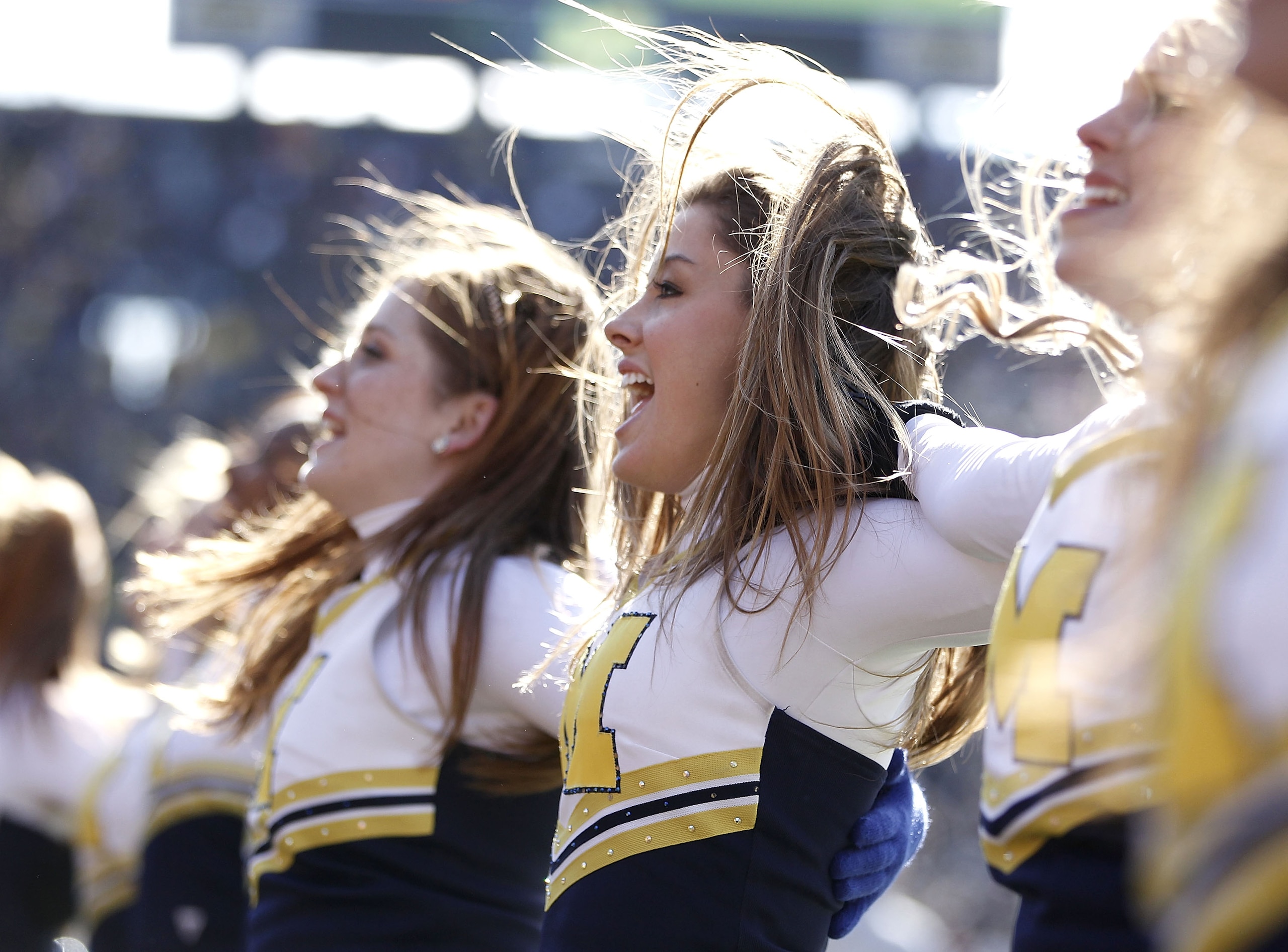 ANN ARBOR, MI - NOVEMBER 06: Members of the Michigan Wolverines dance team perform while playing the Illinios Fighting Illini at Michigan Stadium on November 6, 2010 in Ann Arbor, Michigan. Michigan won the game 67-65.  (Photo by Gregory Shamus/Getty Imag