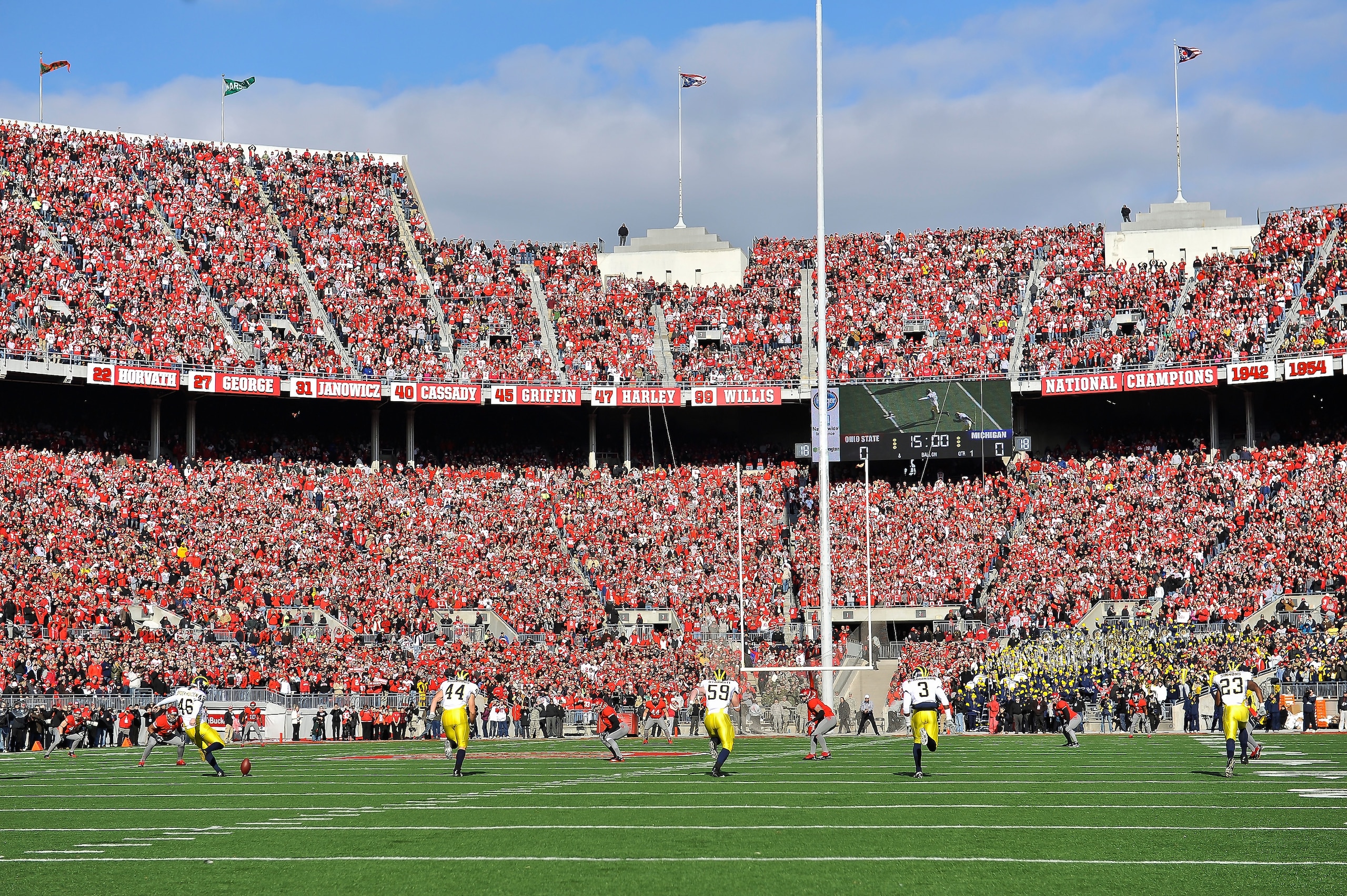 COLUMBUS, OH - NOVEMBER 27:  The Michigan Wolverines kick off to the Ohio State Buckeyes at Ohio Stadium on November 27, 2010 in Columbus, Ohio.  (Photo by Jamie Sabau/Getty Images)