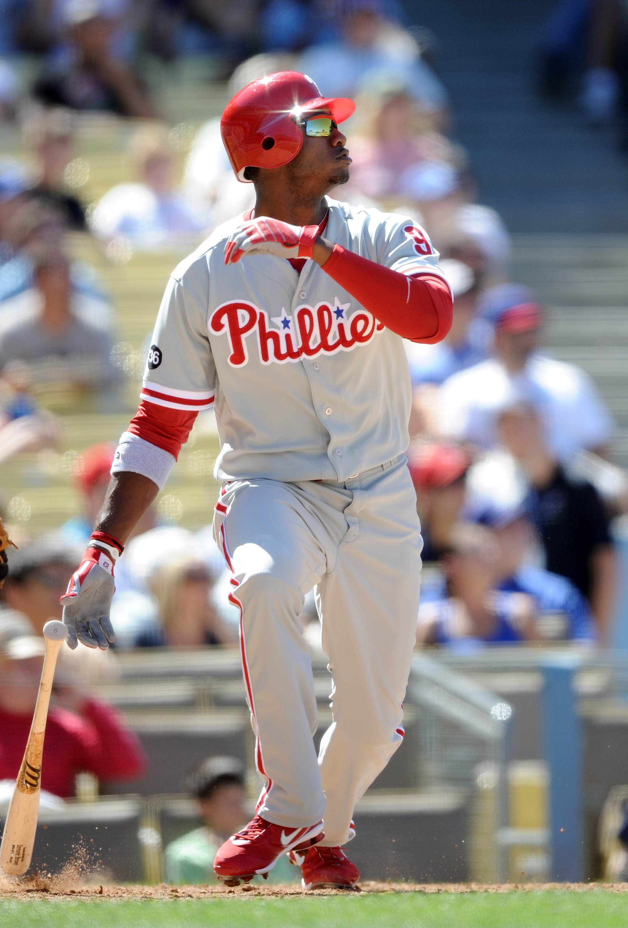 LOS ANGELES, CA - SEPTEMBER 01:  Dominic Brown #9 of the Philadelphia Phillies hits a double against the Los Angeles Dodgers at Dodger Stadium on September 1, 2010 in Los Angeles, California.  (Photo by Harry How/Getty Images)
