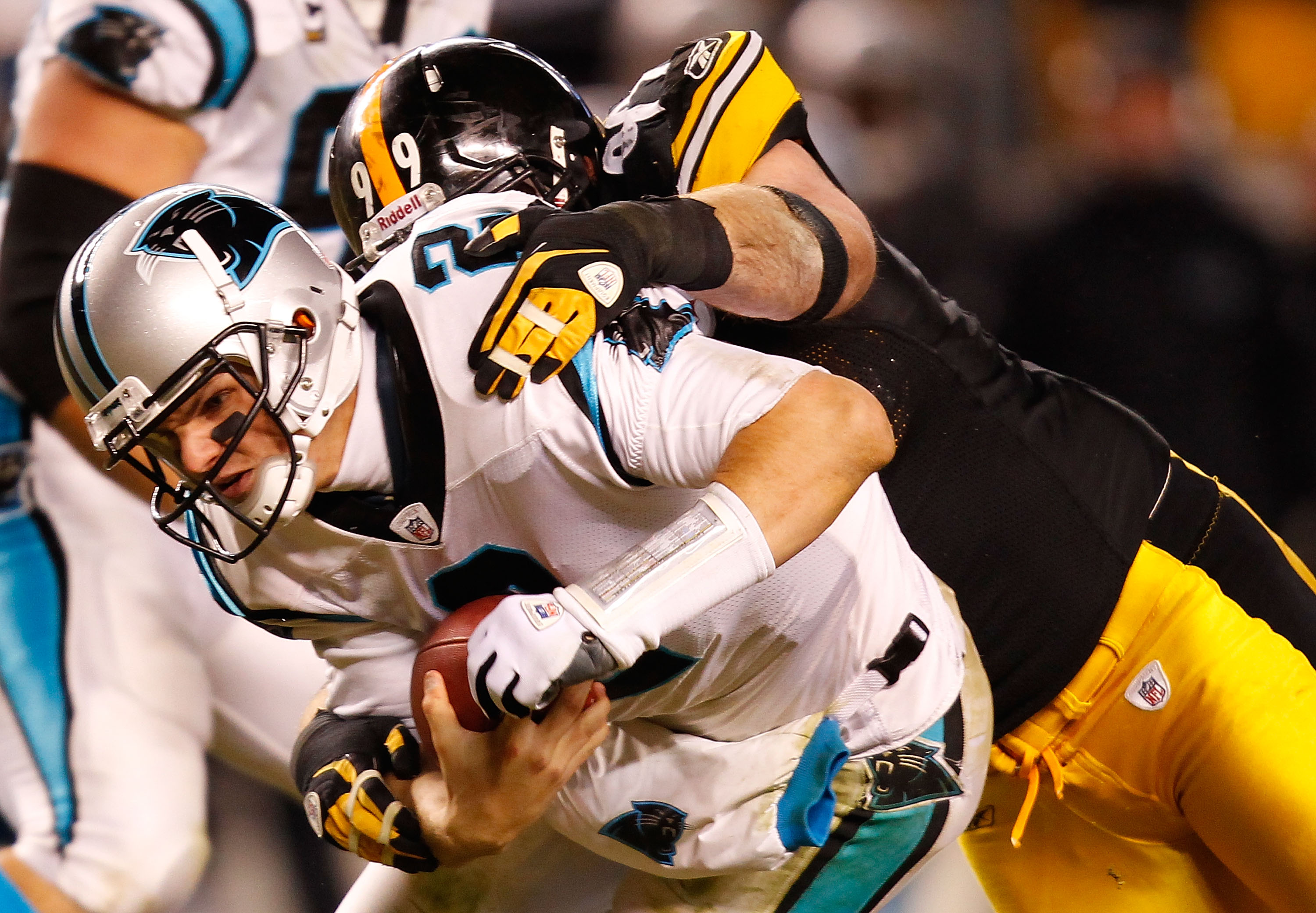 PITTSBURGH - DECEMBER 23:  Jimmy Clausen #2 of the Carolina Panthers is sacked by Brett Keisel #99 of the Pittsburgh Steelers during the game on December 23, 2010 at Heinz Field in Pittsburgh, Pennsylvania.  (Photo by Jared Wickerham/Getty Images)