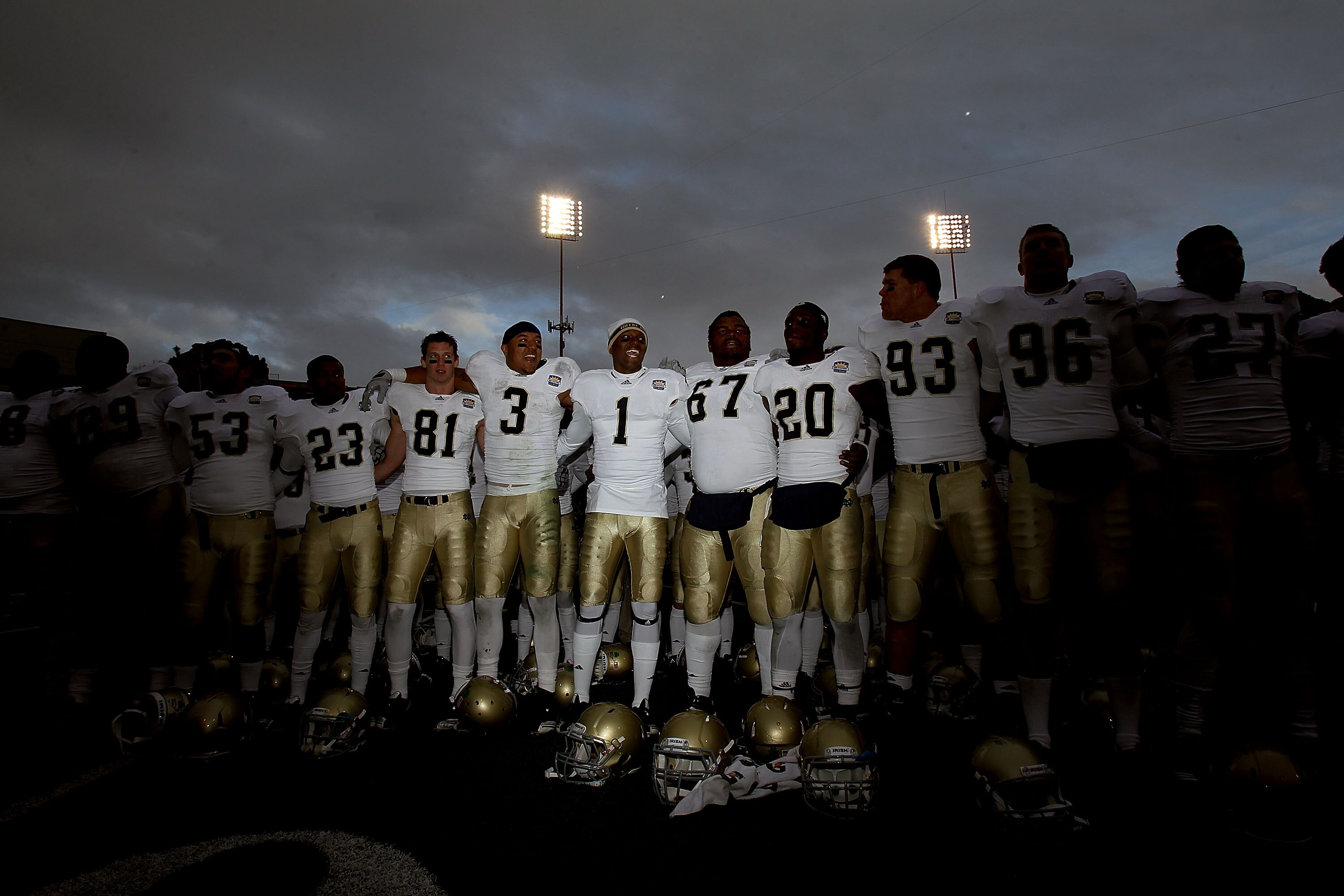 EL PASO, TX - DECEMBER 30:  The Notre Dame Fighting Irish celebrate a 33-17 win against the Miami Hurricanes at Sun Bowl on December 30, 2010 in El Paso, Texas.  (Photo by Ronald Martinez/Getty Images)