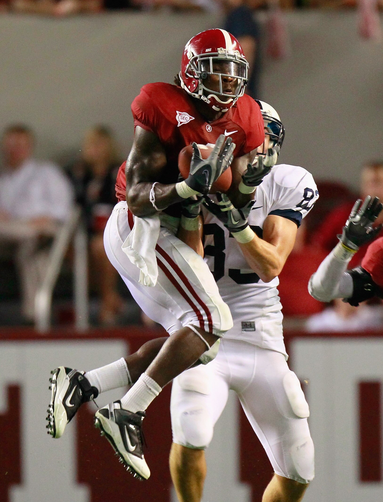 TUSCALOOSA, AL - SEPTEMBER 11:  Mark Barron #4 of the Alabama Crimson Tide intercepts a pass intended for Brett Brackett #83 of the Penn State Nittany Lions at Bryant-Denny Stadium on September 11, 2010 in Tuscaloosa, Alabama.  (Photo by Kevin C. Cox/Gett