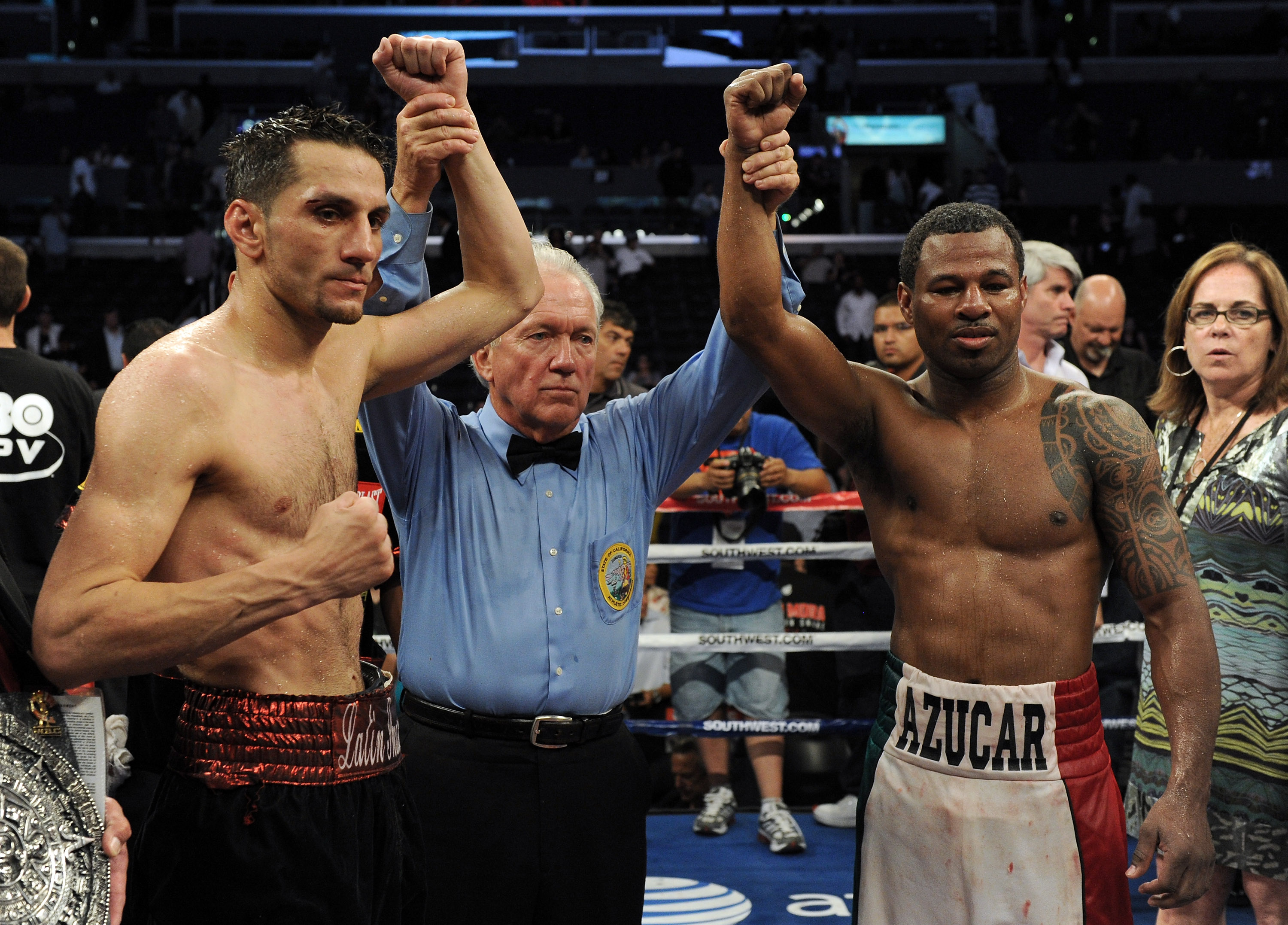 LOS ANGELES, CA - SEPTEMBER 18: Referee Pat Russell poses with Shane Mosley and Sergio Mora after the Middleweight bout at Staples Center on September 18, 2010 in Los Angeles, California. The fight ended in a draw. (Photo by Harry How/Getty Images)