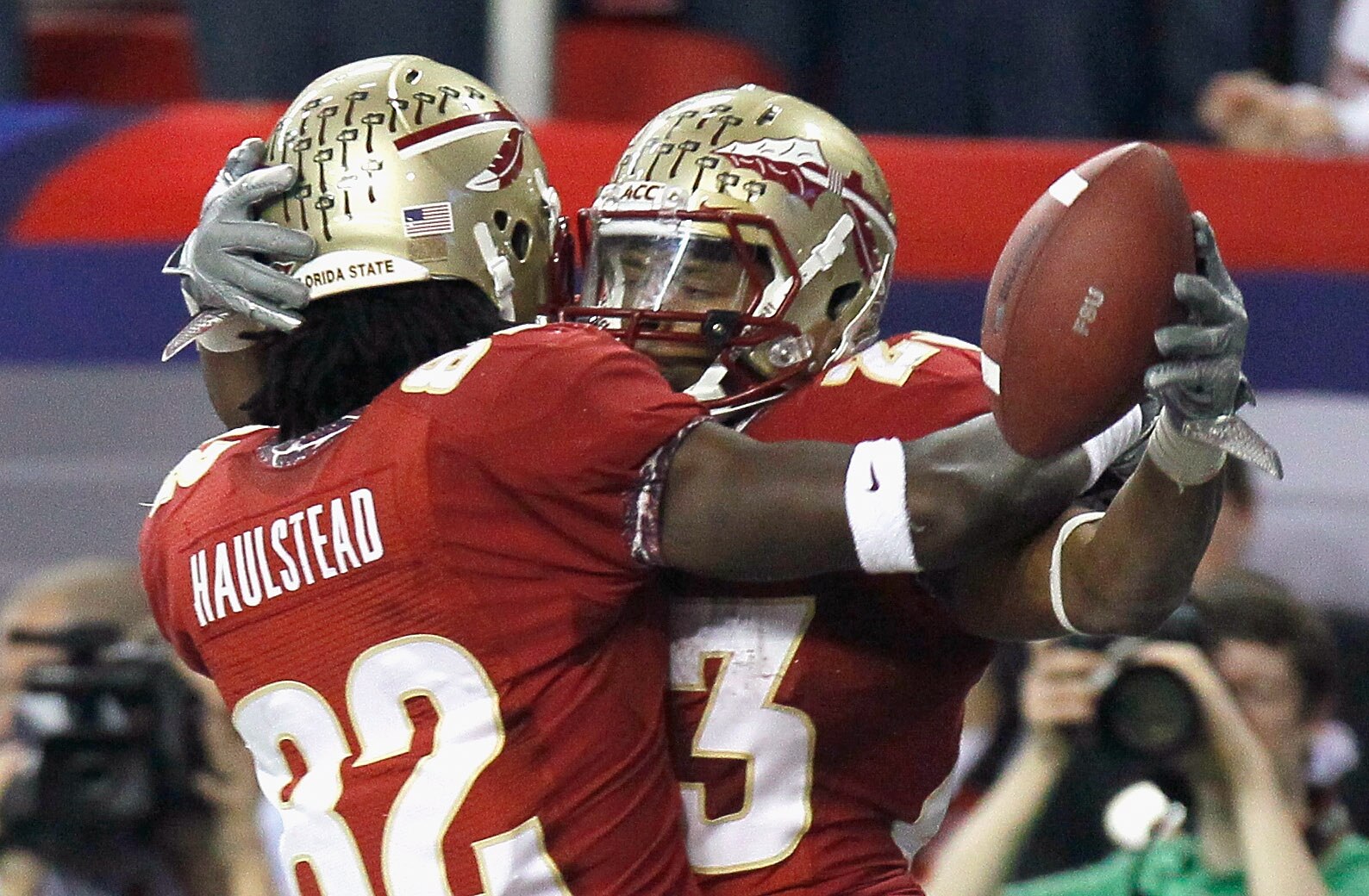 ATLANTA, GA - DECEMBER 31:  Chris Thompson #23 of the Florida State Seminoles celebrates scoring a touchdown against the South Carolina Gamecocks with Willie Haulstead #82 during the 2010 Chick-fil-A Bowl at Georgia Dome on December 31, 2010 in Atlanta, G