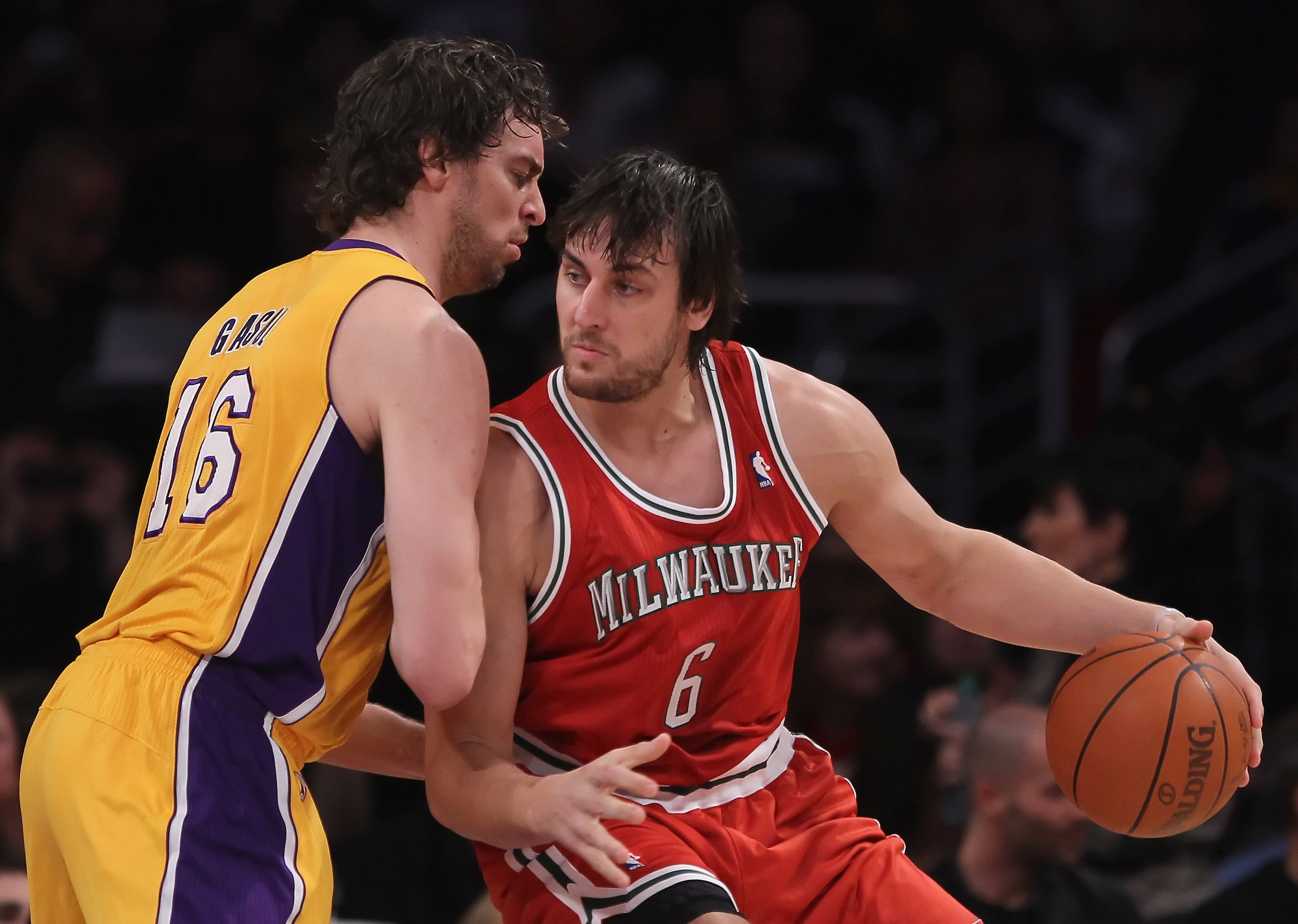 LOS ANGELES, CA - DECEMBER 21:  Pau Gasol #16 of the Los Angeles Lakers defends Andrew Bogut #6 of the Milwaukee Bucks during the first half at Staples Center on December 21, 2010 in Los Angeles, California. The Bucks defeated the Lakers 98-79. NOTE TO US
