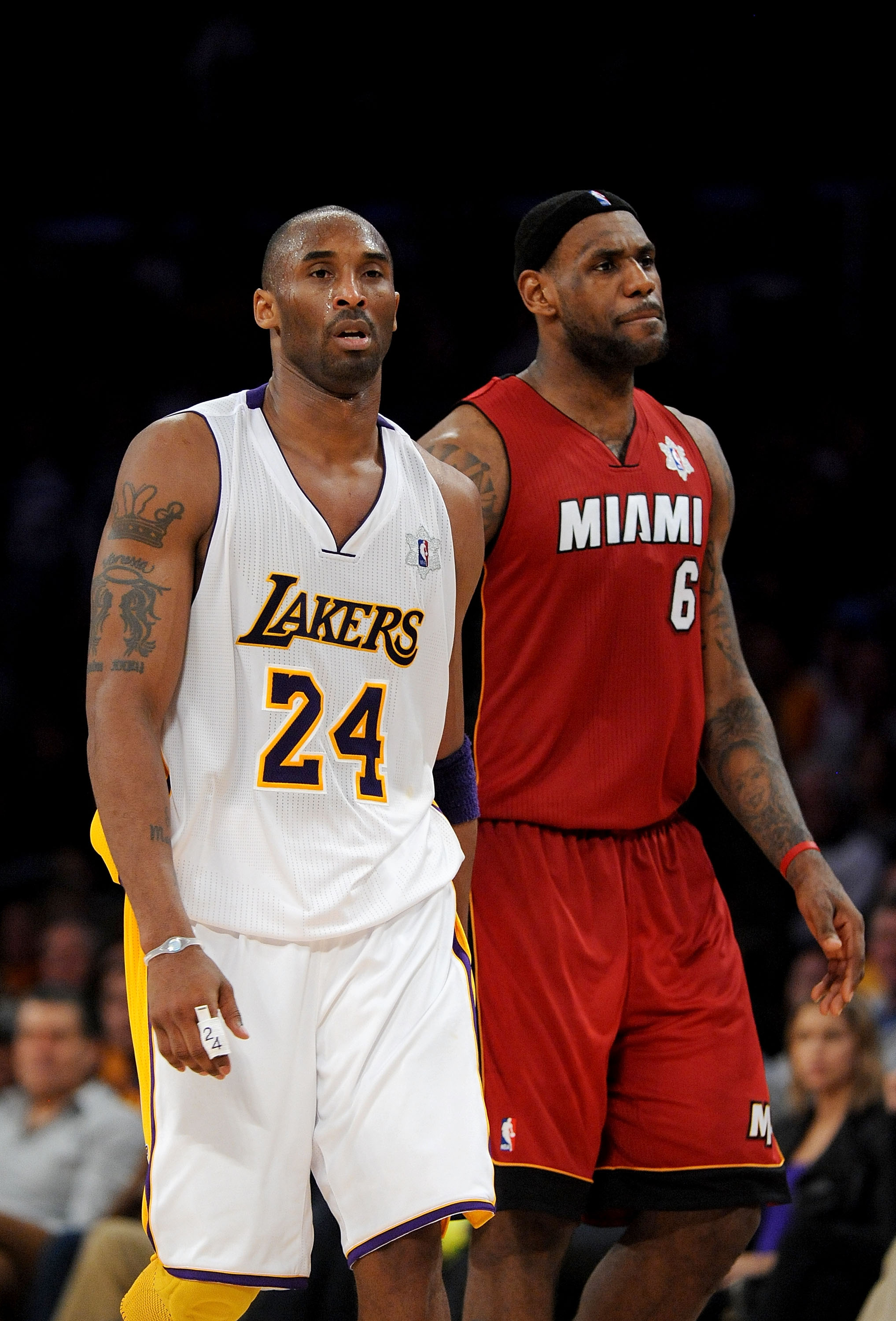 LOS ANGELES, CA - DECEMBER 25:  (L-R) Kobe Bryant #24 of the Los Angeles Lakers and LeBron James #6 of the Miami Heat walk upcourt during the game at Staples Center on December 25, 2010 in Los Angeles, California. NOTE TO USER: User expressly acknowledges