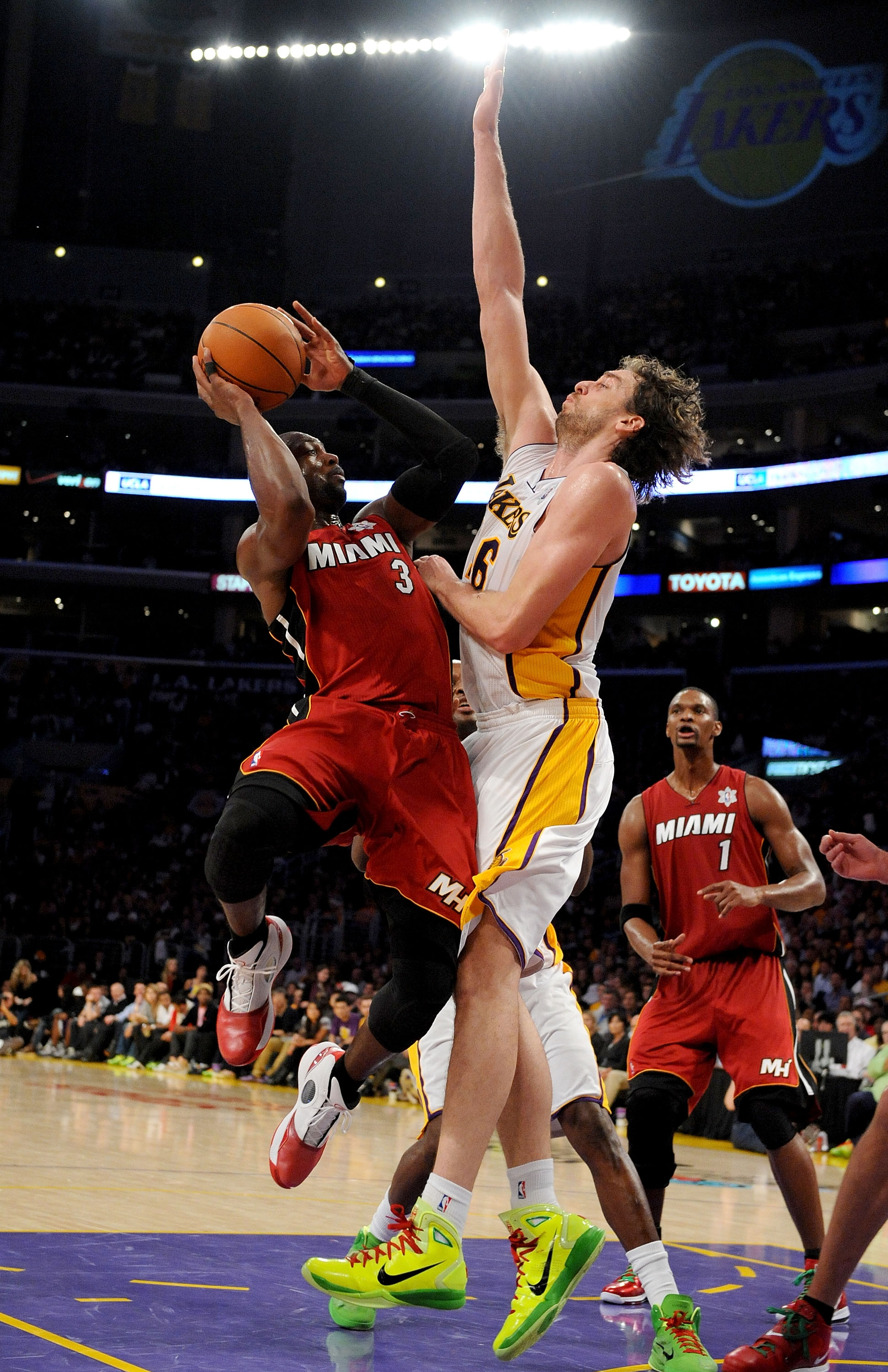 LOS ANGELES, CA - DECEMBER 25:  Dwayne Wade #3 of the Miami Heat puts a shot up against Pau Gasol #16 of the Los Angeles Lakers at Staples Center on December 25, 2010 in Los Angeles, California. NOTE TO USER: User expressly acknowledges and agrees that, b