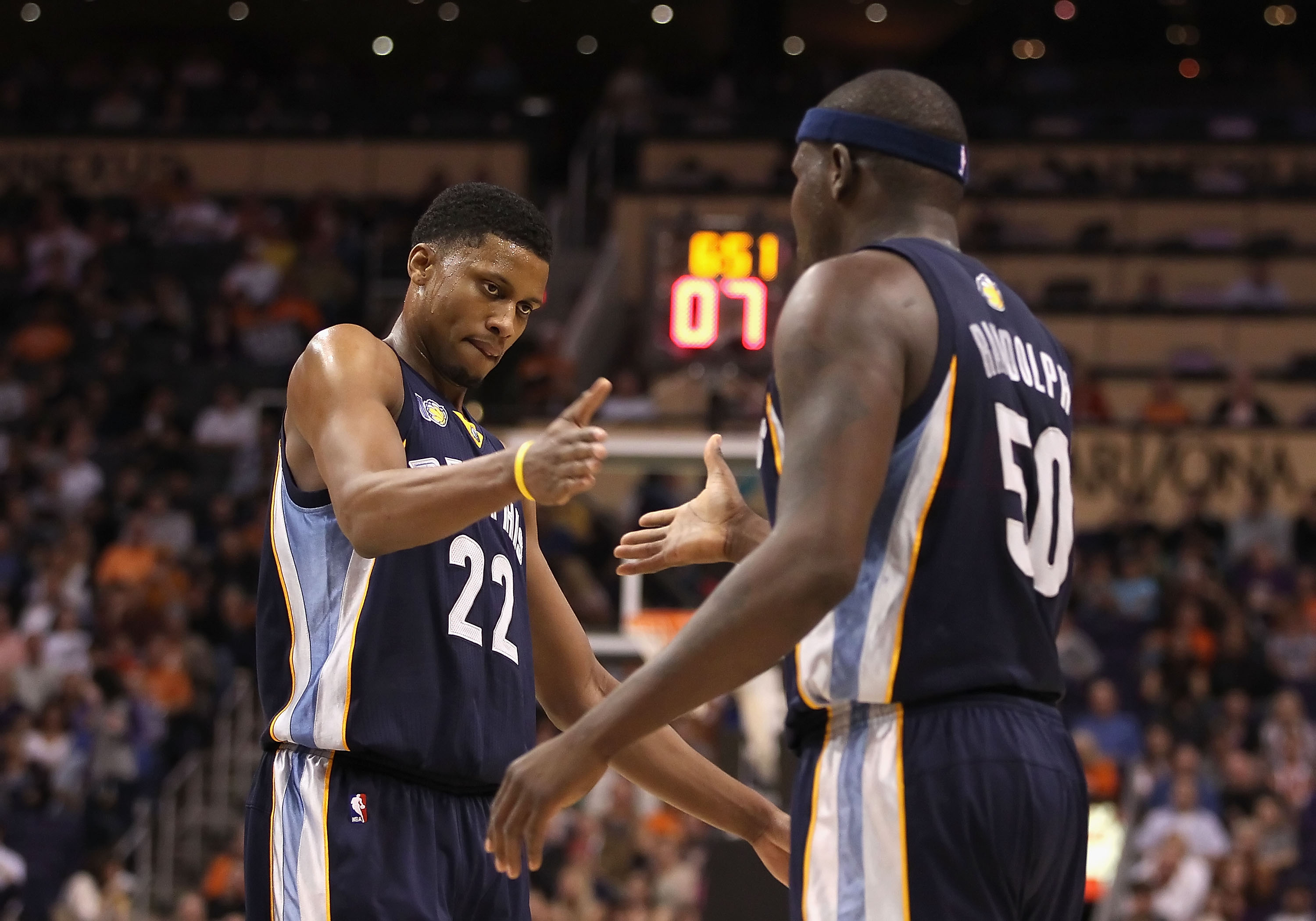 PHOENIX - DECEMBER 08:  Rudy Gay #22 of the Memphis Grizzlies high fives teammate Zach Randolph #50 after scoring against the Phoenix Suns during the NBA game at US Airways Center on December 8, 2010 in Phoenix, Arizona. The Grizzlies defeated the Suns 10