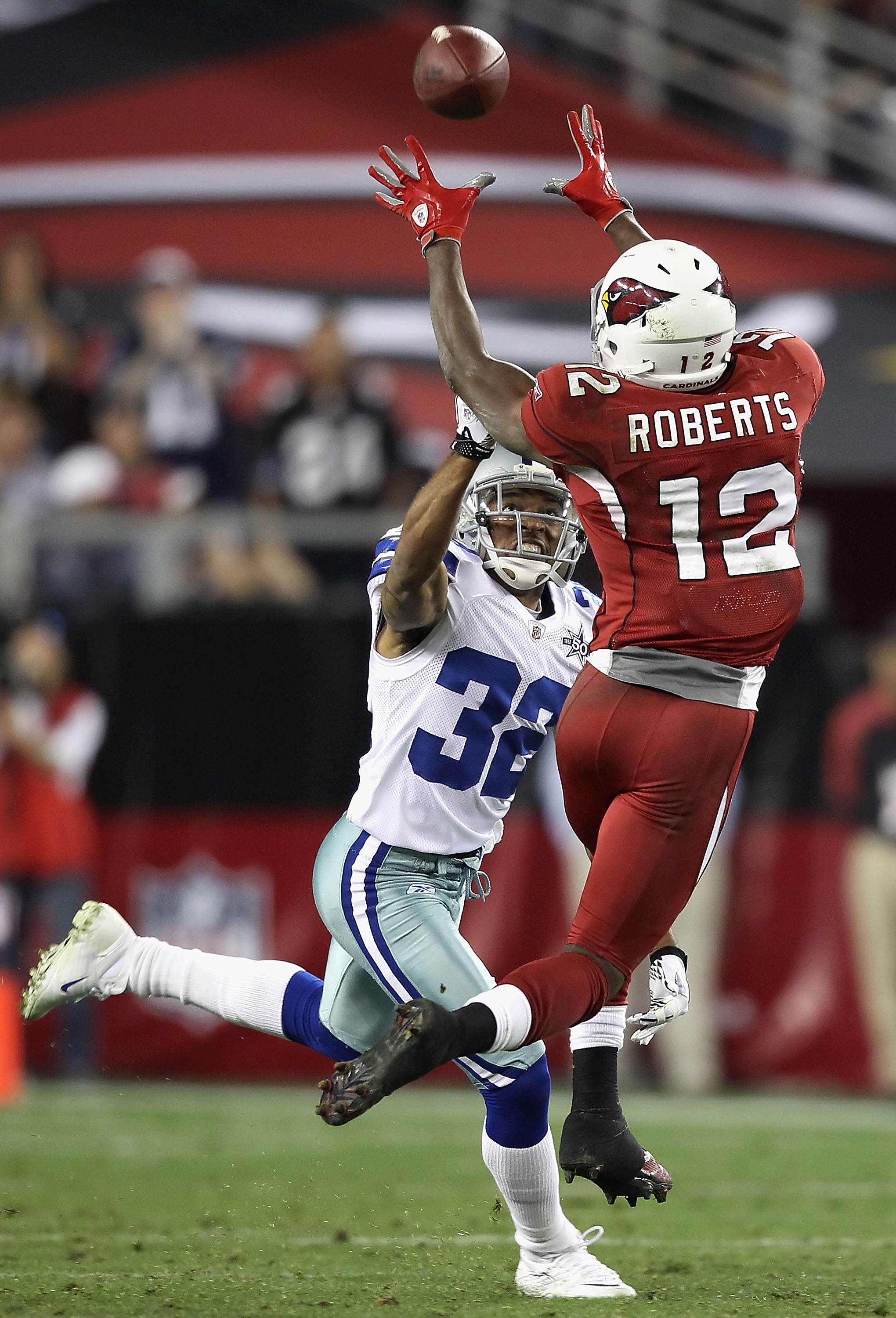 Arizona Cardinals wide receiver Andre Roberts (12) scores a