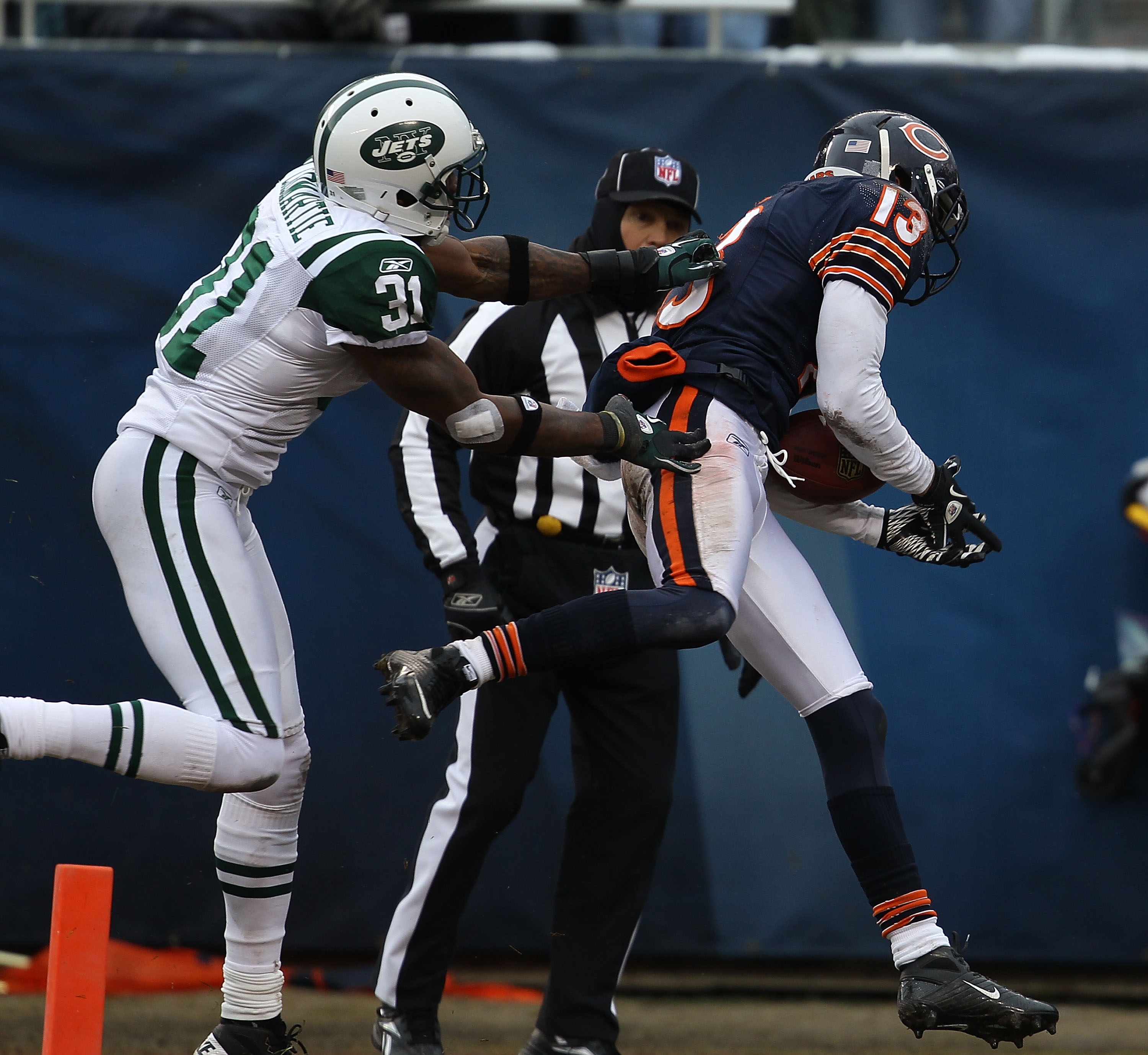 CHICAGO, IL - DECEMBER 26: Johnny Knox #13 of the Chicago Bears catches a touchdown pass in front of Antonio Cromartie #31 of the New York Jets at Soldier Field on December 26, 2010 in Chicago, Illinois. The Bears defeated the Jets 38-34. (Photo by Jonath
