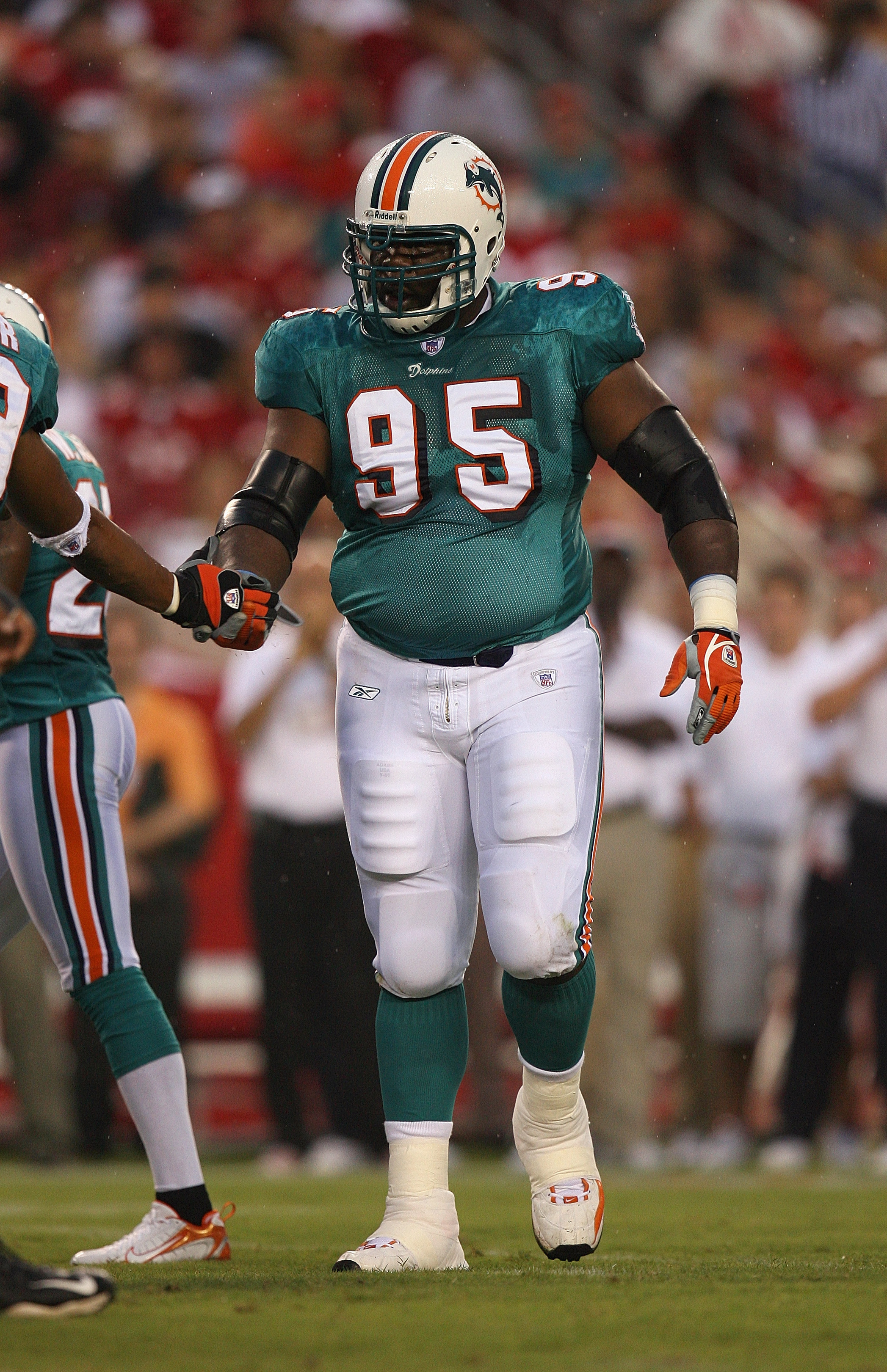 Miami Dolphins' Ricky Williams glances at the scoreboard during the first  half in a game against the Tampa Bay Buccaneers at Raymond James Stadium Oct.  16, 2005 in Tampa, Fl. The Buccaneers