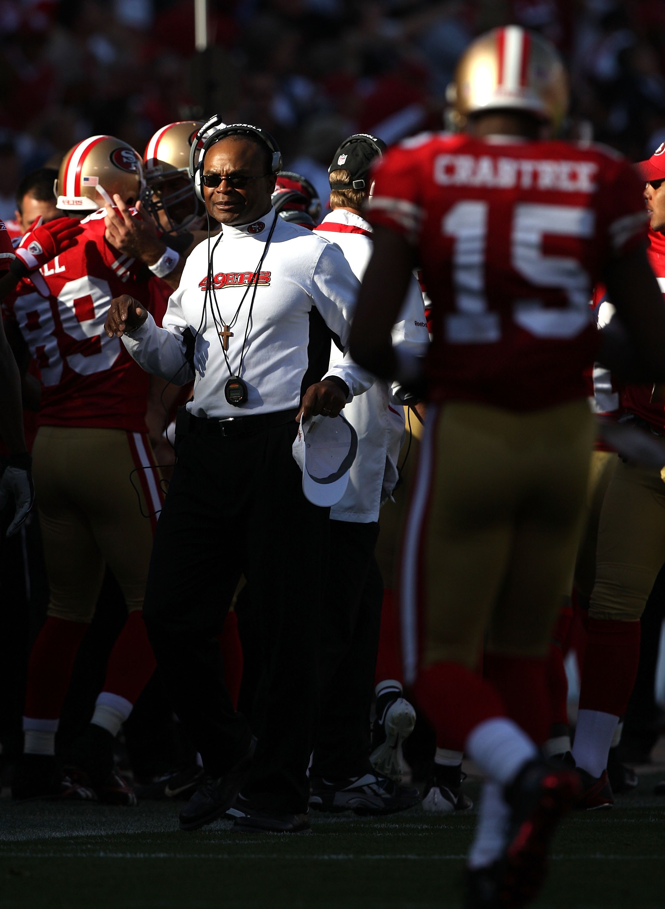 SAN FRANCISCO - NOVEMBER 08:  Head coach Mike Singletary of the San Francisco 49ers looks on with Michael Crabtree #15 against the Tennessee Titans during an NFL game on November 8, 2009 at Candlestick Park in San Francisco, California.  (Photo by Jed Jac
