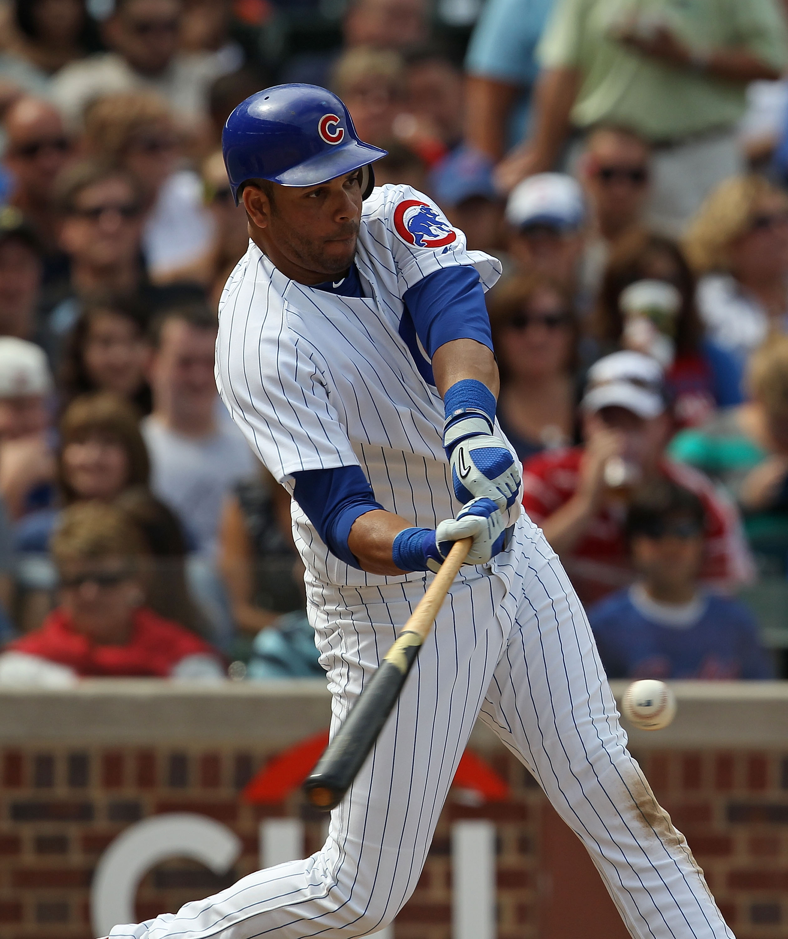 CHICAGO - SEPTEMBER 05: Aramis Ramirez #16 of the Chicago Cubs hits his 22nd home run of the year, a two run shot in the 3rd inning, against the New York Mets at Wrigley Field on September 5, 2010 in Chicago, Illinois. (Photo by Jonathan Daniel/Getty Imag