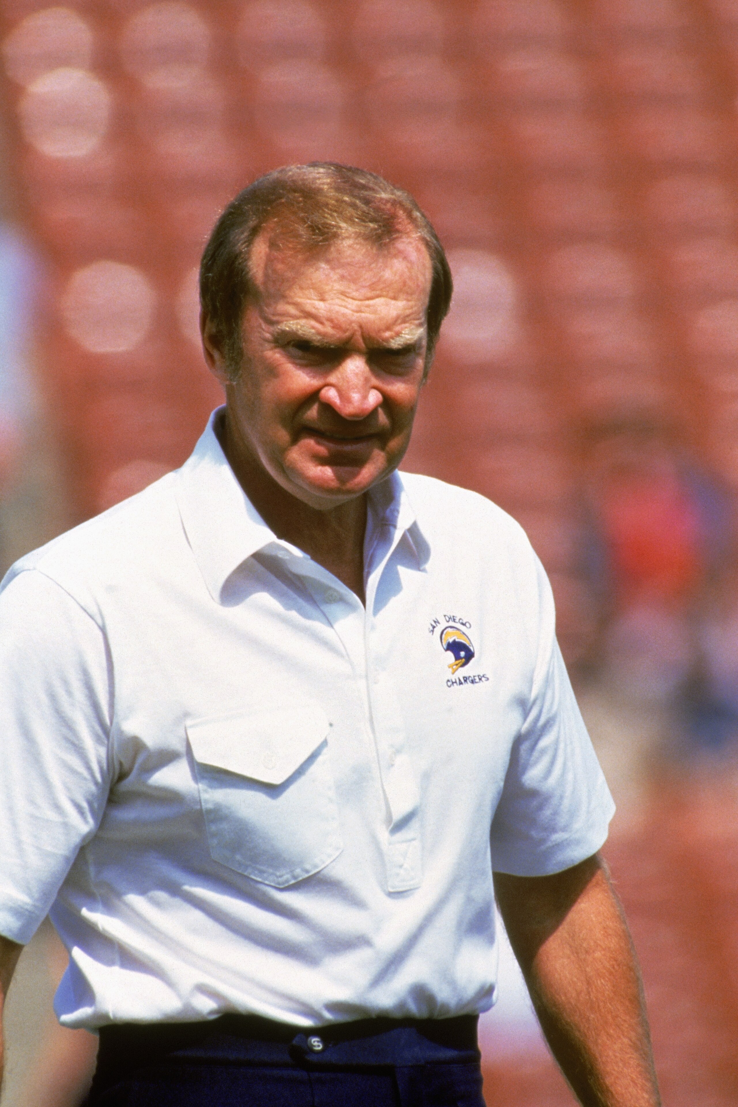LOS ANGELES - 1986:  Head coach Don Coryell of the San Diego Chargers walks on the field before a 1986 NFL game against the Los Angeles Raiders at the LA Memorial Coliseum in Los Angeles, California.  The Raiders defeated the Chargers 17-13.  (Photo by Ri