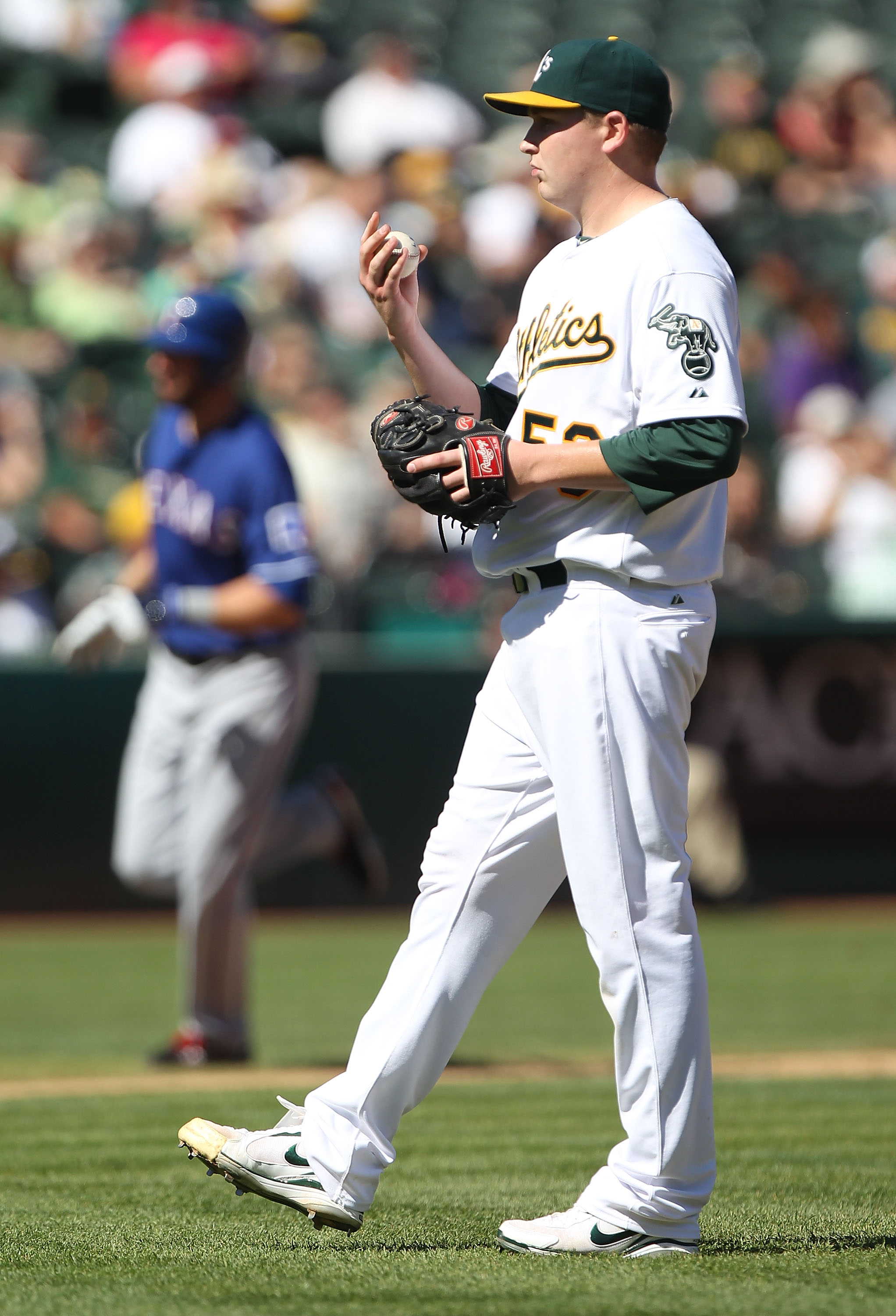 OAKLAND, CA - SEPTEMBER 26:  Jeff Francoeur #21 of the Texas Rangers rounds the bases after hitting a home run off of Trevor Cahill #53 of the Oakland Athletics during a Major League Baseball game at the Oakland-Alameda County Coliseum on September 26, 20