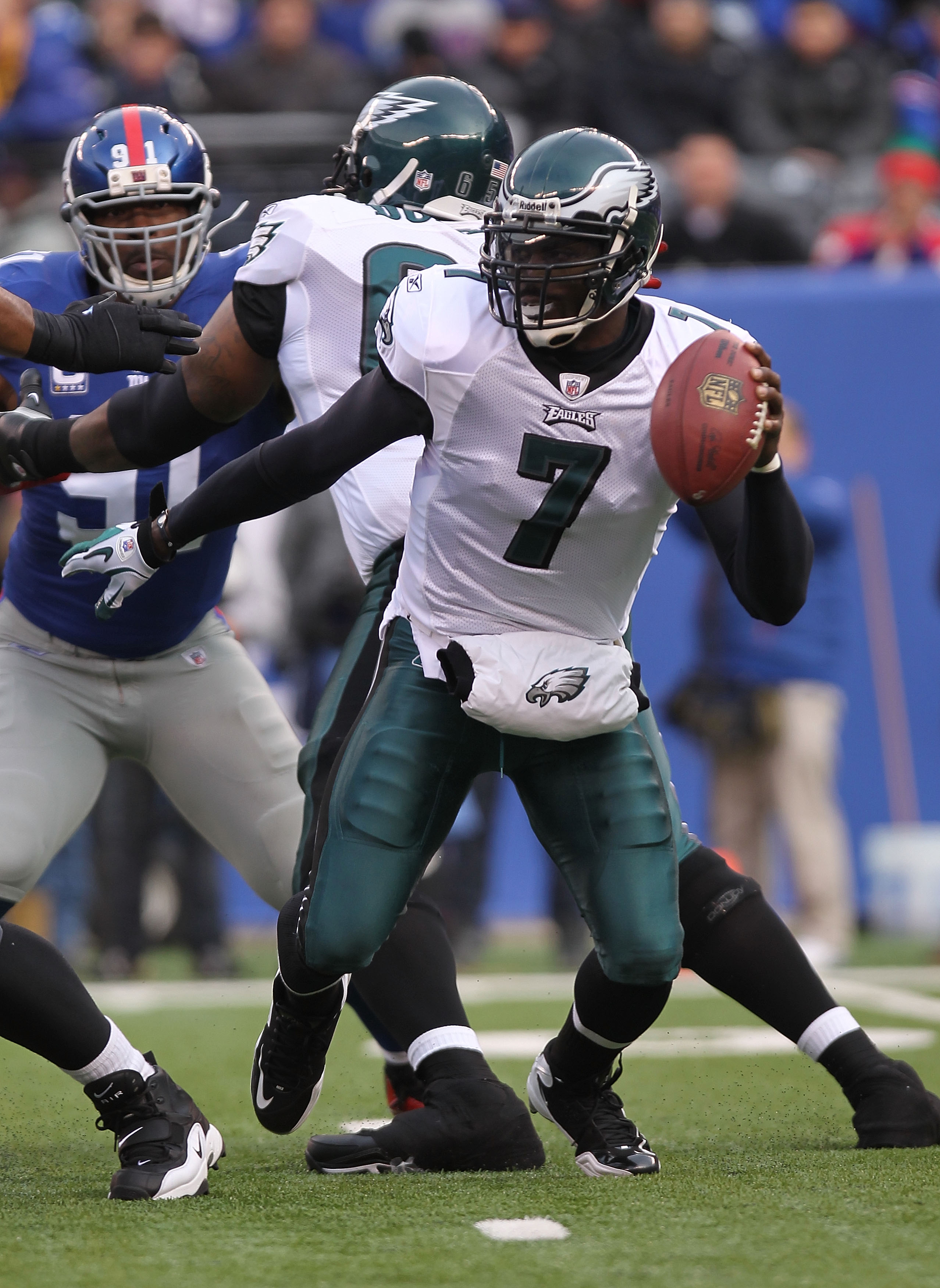 Philadelphia Eagles quarterback Michael Vick (7) calls a play at the line  of scrimmage in the first half of an NFL football game against the Atlanta  Falcons at the Georgia Dome in