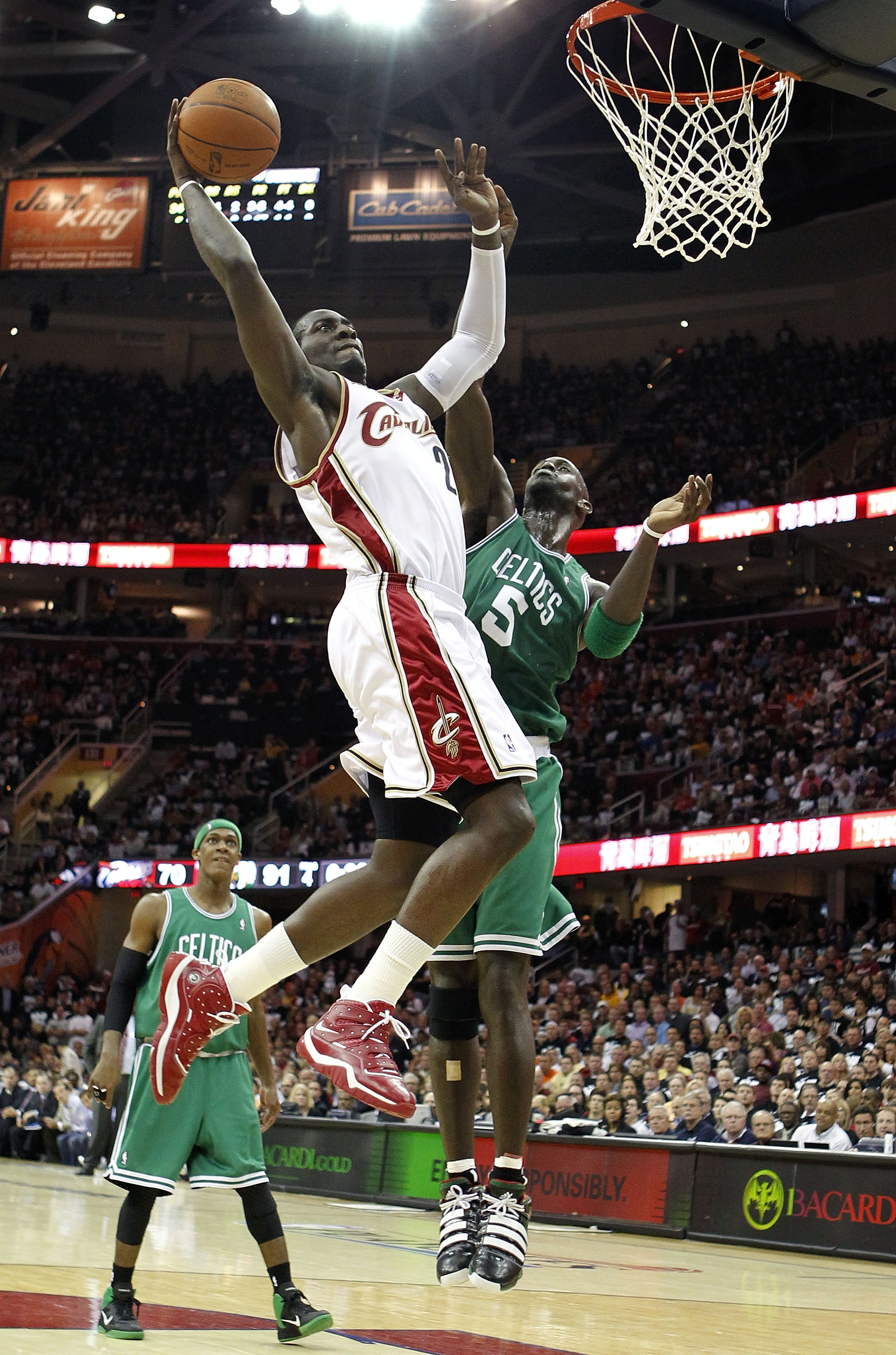 CLEVELAND - MAY 03:  J.J. Hickson #21 of the Cleveland Cavaliers gets in for a dunk past Kevin Garnett #5 of the Boston Celtics during Game Two of the Eastern Conference Semifinals during the 2010 NBA Playoffs at Quicken Loans Arena on May 3, 2010 in Clev
