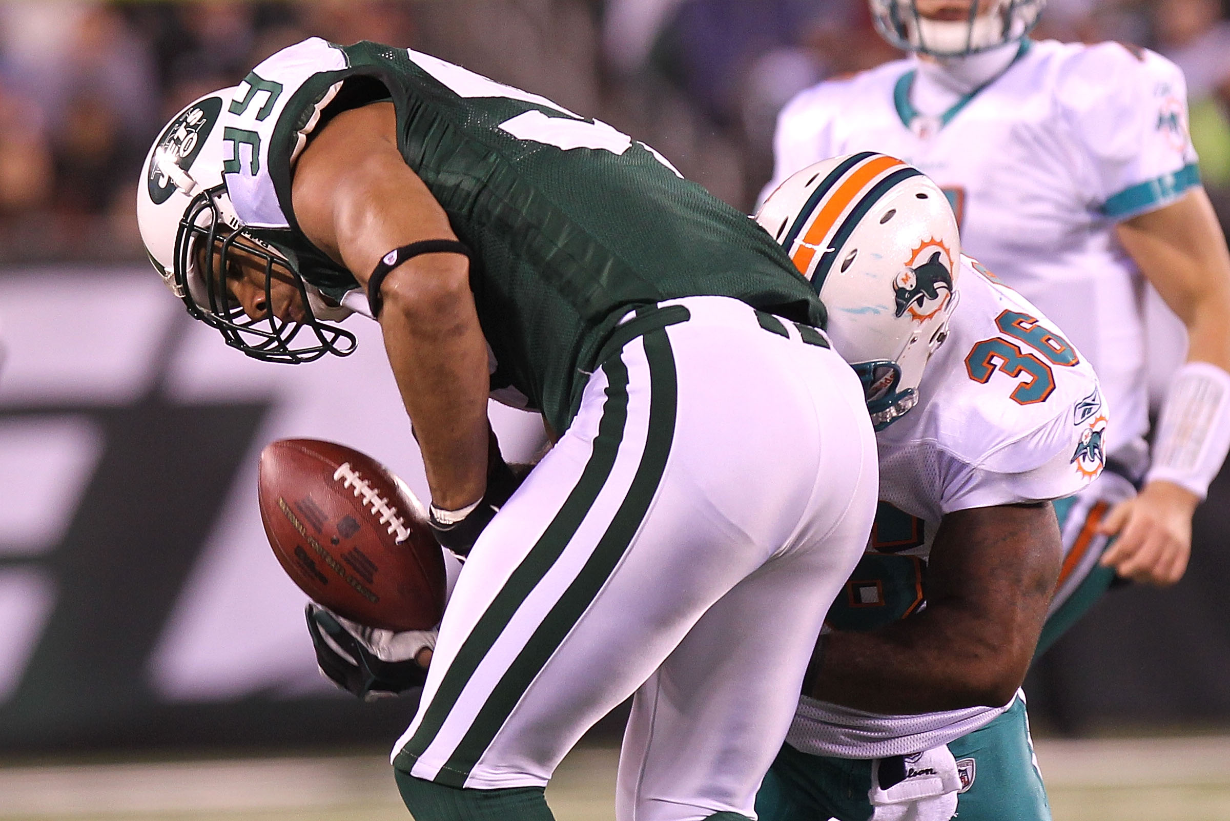 26 September 2010: NY NY Jets Vs Miami Dolphins: Jets 99 Jason Taylor  smiles as the