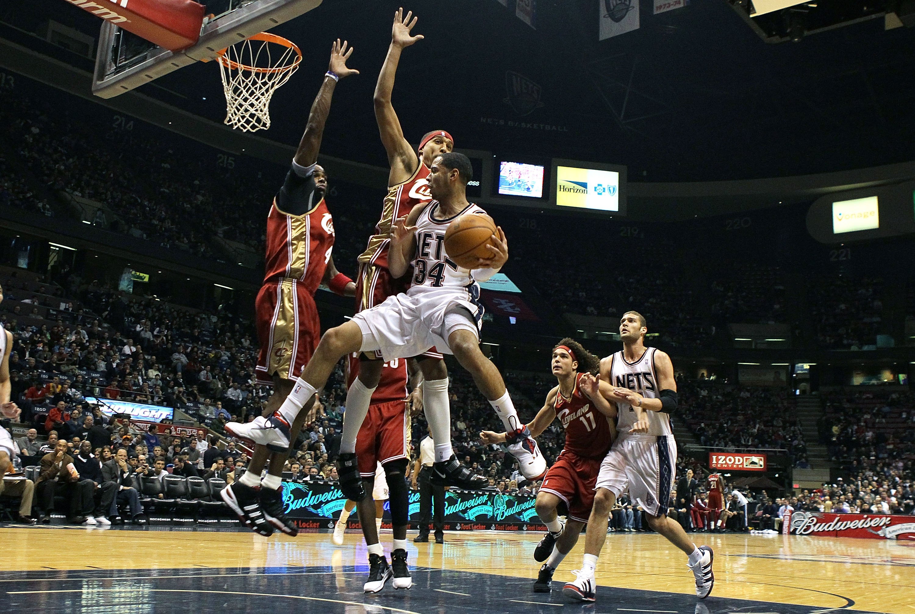 EAST RUTHERFORD, NJ - MARCH 03:  Devin Harris #34 of the New Jersey Nets drives to the hoop against the Cleveland Cavaliers at the Izod Center on March 3, 2010 in East Rutherford, New Jersey.NOTE TO USER: User expressly acknowledges and agrees that, by do