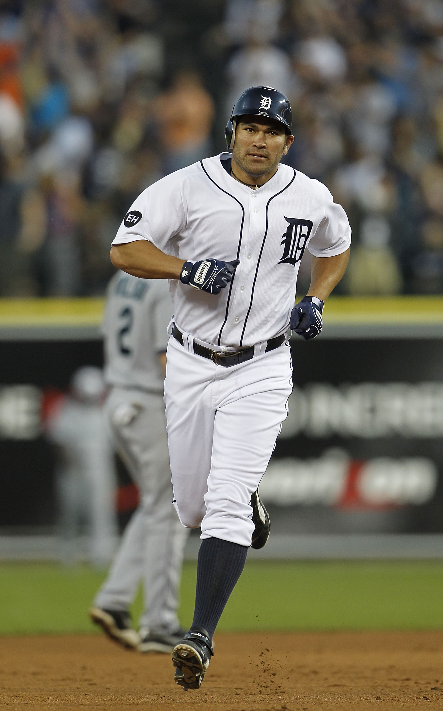 DETROIT - JULY 02:  Johnny Damon #18 of the Detroit Tigers hits a seventh inning two run home run during the game against the Seattle Mariners on July 2, 2010 at Comerica Park in Detroit, Michigan.  (Photo by Leon Halip/Getty Images)