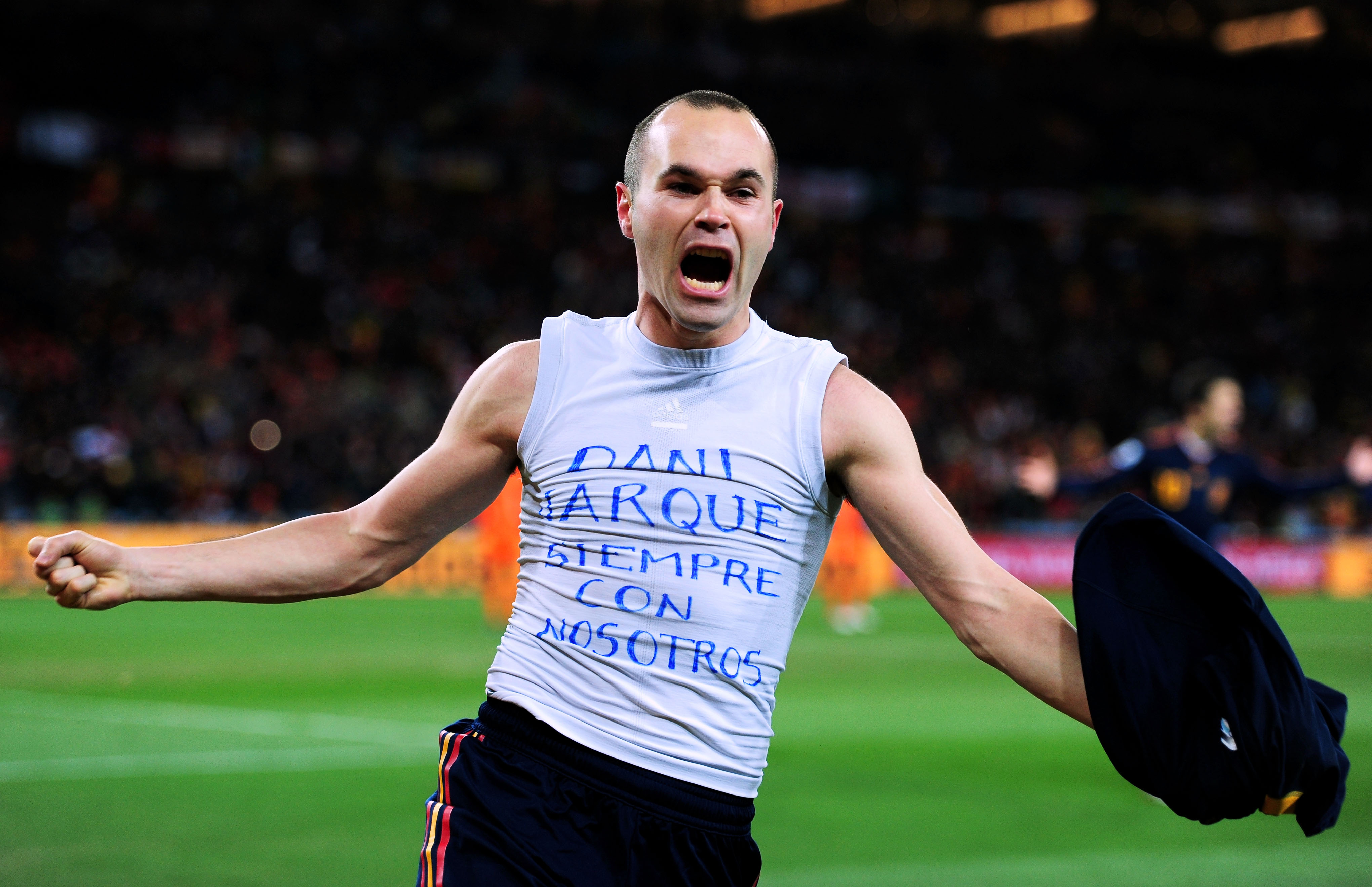 JOHANNESBURG, SOUTH AFRICA - JULY 11:  Andres Iniesta of Spain celebrates scoring his side's first goal during the 2010 FIFA World Cup South Africa Final match between Netherlands and Spain at Soccer City Stadium on July 11, 2010 in Johannesburg, South Af