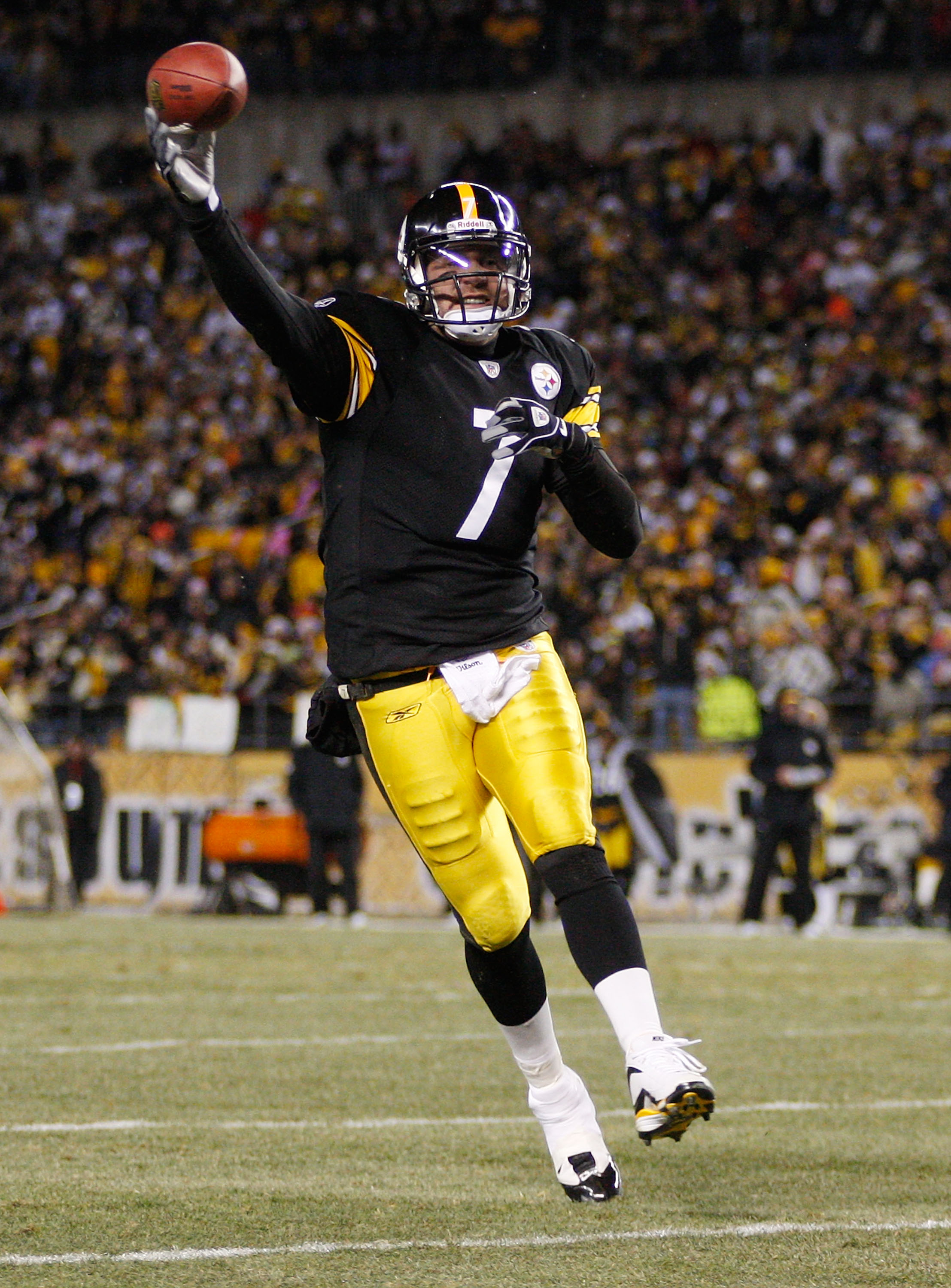 Cincinnati Bengals Michael Johnson holds on the jersey and sacks Pittsburgh  Steelers quarterback Ben Roethlisberger for a lost of eight yards in the  second quarter at Heinz Field in Pittsburgh, Pennsylvania on