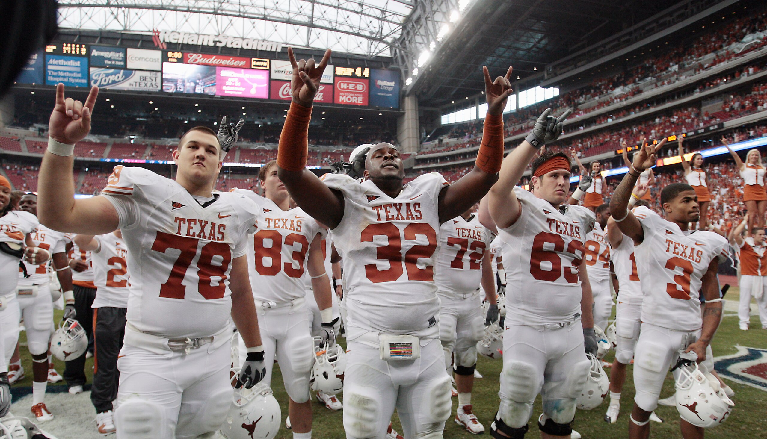 HOUSTON - SEPTEMBER 04:  Texas Longhorns David Snow #78, Traylon Shead #32, Greg Smith #83 and DeSean Hales #3 celebrate their 34-17 win over the Rice Owls at Reliant Stadium on September 4, 2010 in Houston, Texas.  (Photo by Bob Levey/Getty Images)