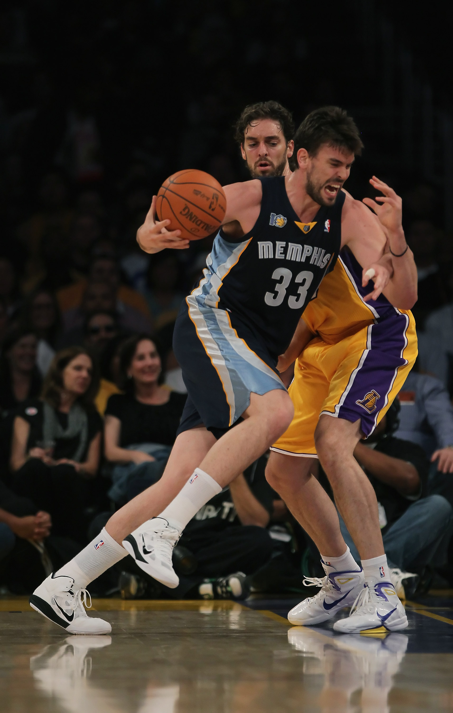 LOS ANGELES, CA - NOVEMBER 02:  Marc Gasol #33 of the Memphis Grizzlies drives past Pau Gasol #16 of the Los Angeles Lakers to the basket during the first quarter at Staples Center on November 2, 2010 in Los Angeles, California. NOTE TO USER: User express
