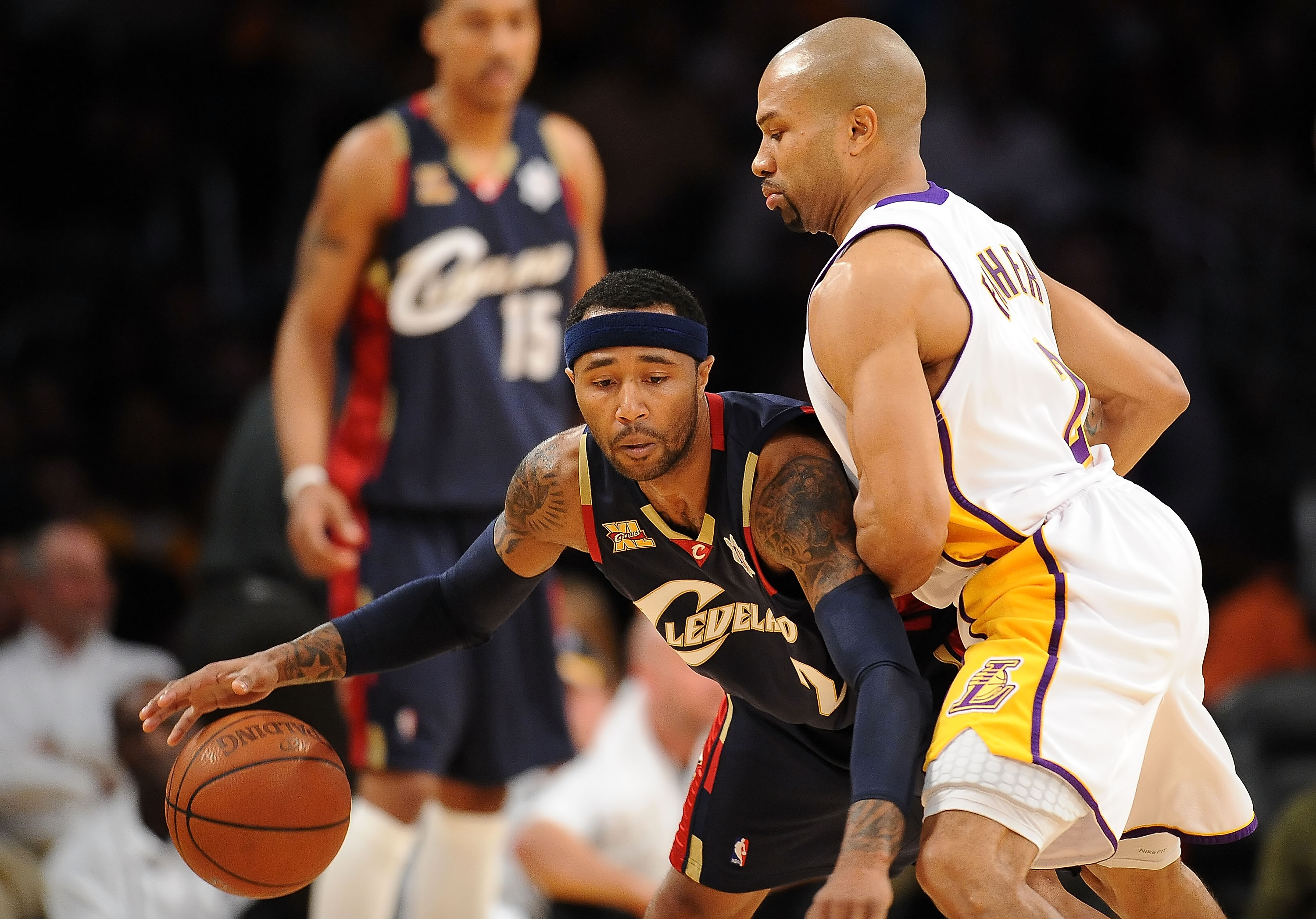 LOS ANGELES, CA - DECEMBER 25: Mo Williams #2 of the Cleveland Cavaliers drives against Derek Fisher #2 of the Los Angeles Lakers at Staples Center on December 25, 2009 in Los Angeles, California. NOTE TO USER: User expressly acknowledges and agrees that,