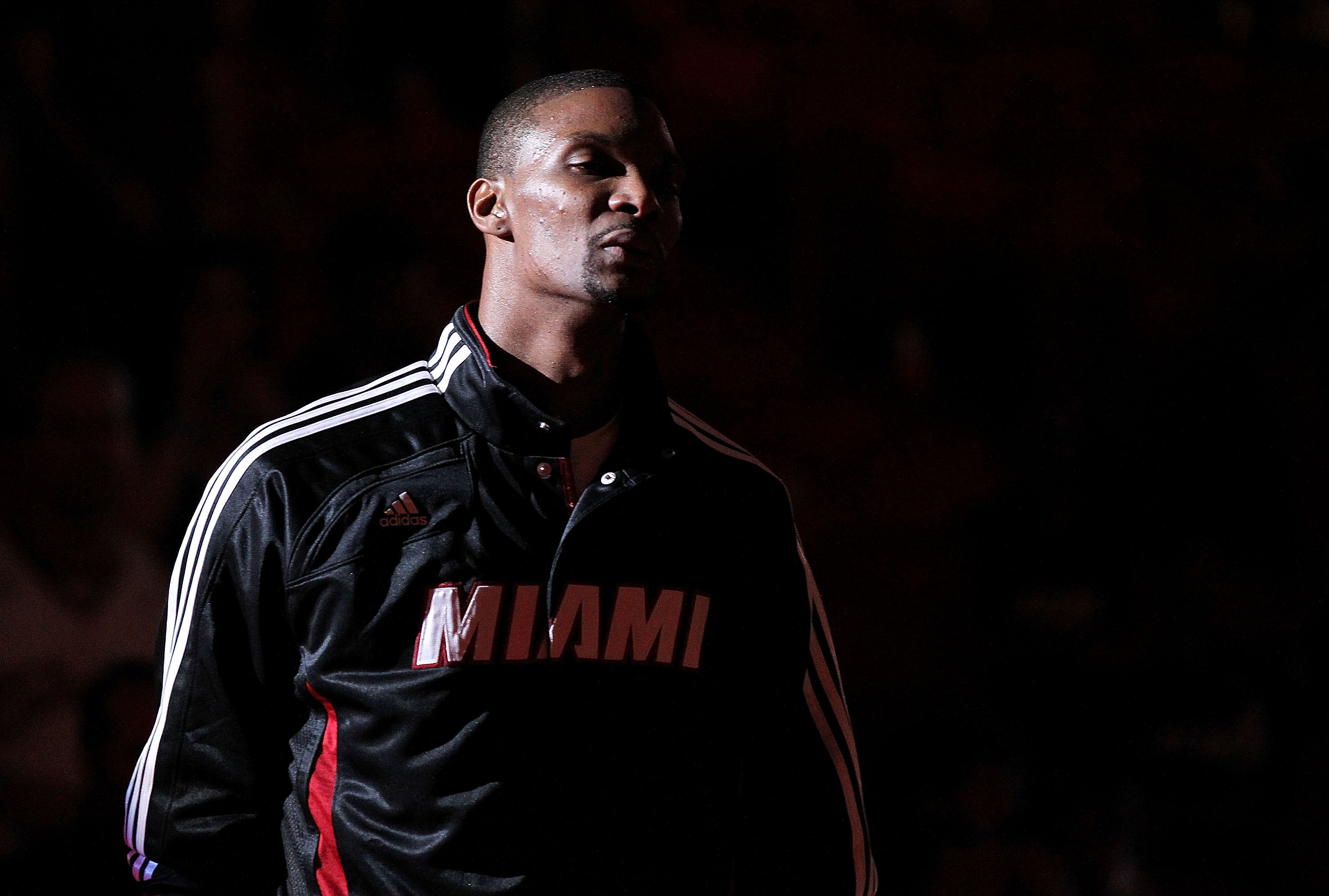 MIAMI, FL - DECEMBER 04:  Chris Bosh #1 of the Miami Heat looks on  during pregame against the Atlanta Hawks at American Airlines Arena on December 4, 2010 in Miami, Florida. NOTE TO USER: User expressly acknowledges and agrees that, by downloading and/or