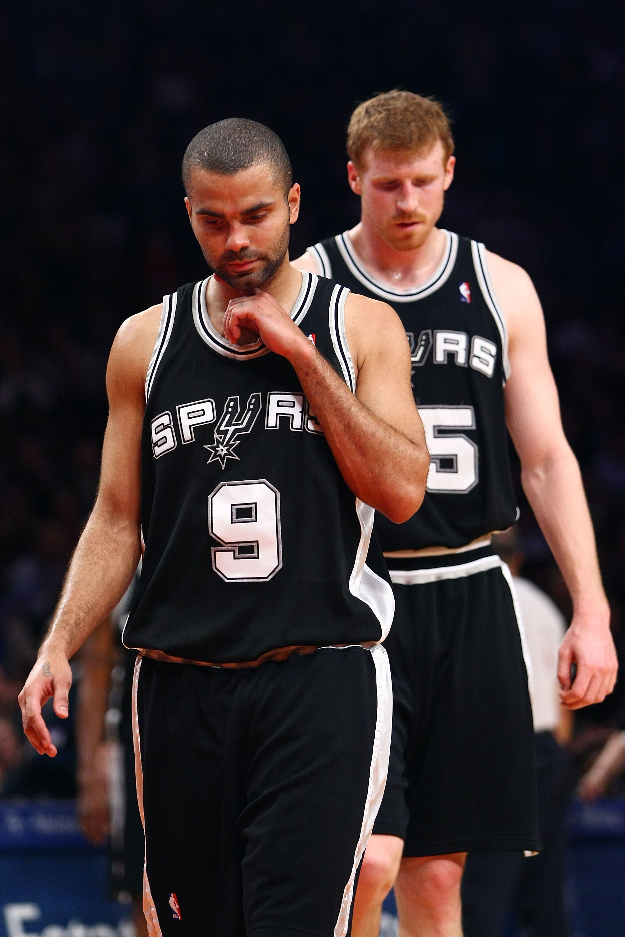 NEW YORK - FEBRUARY 17:  Tony Parker #9 and Matt Bonner #15 of the San Antonio Spurs walk up the court against the New York Knicks at Madison Square Garden February 17, 2009 in New York City. NOTE TO USER: User expressly acknowledges and agrees that, by d