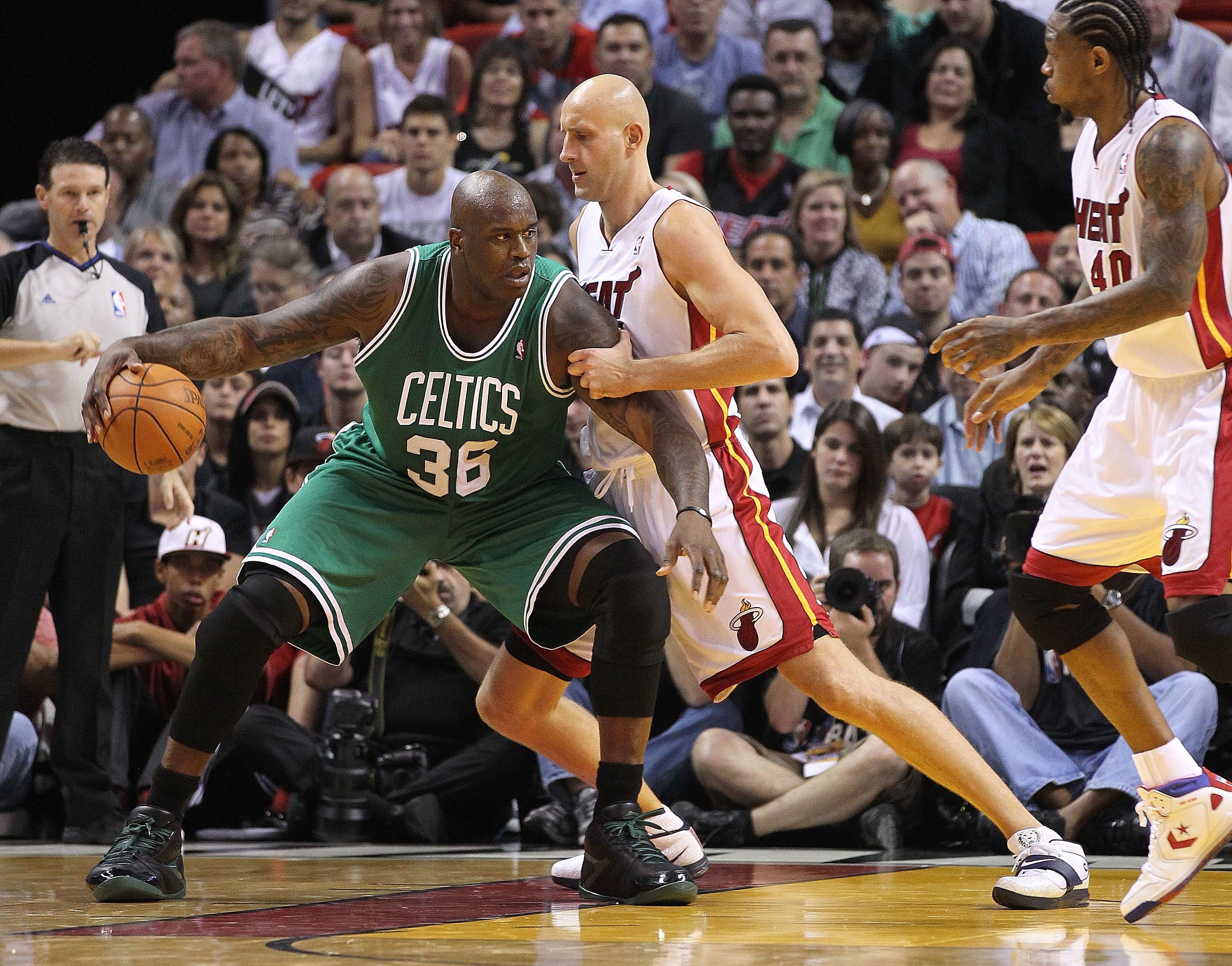 MIAMI - NOVEMBER 11:  Shaquille O'Neal #36 of the Boston Celtics is guarded by Zydrunas Ilgauskas #11 during a game against the Miami Heat at American Airlines Arena on November 11, 2010 in Miami, Florida. NOTE TO USER: User expressly acknowledges and agr