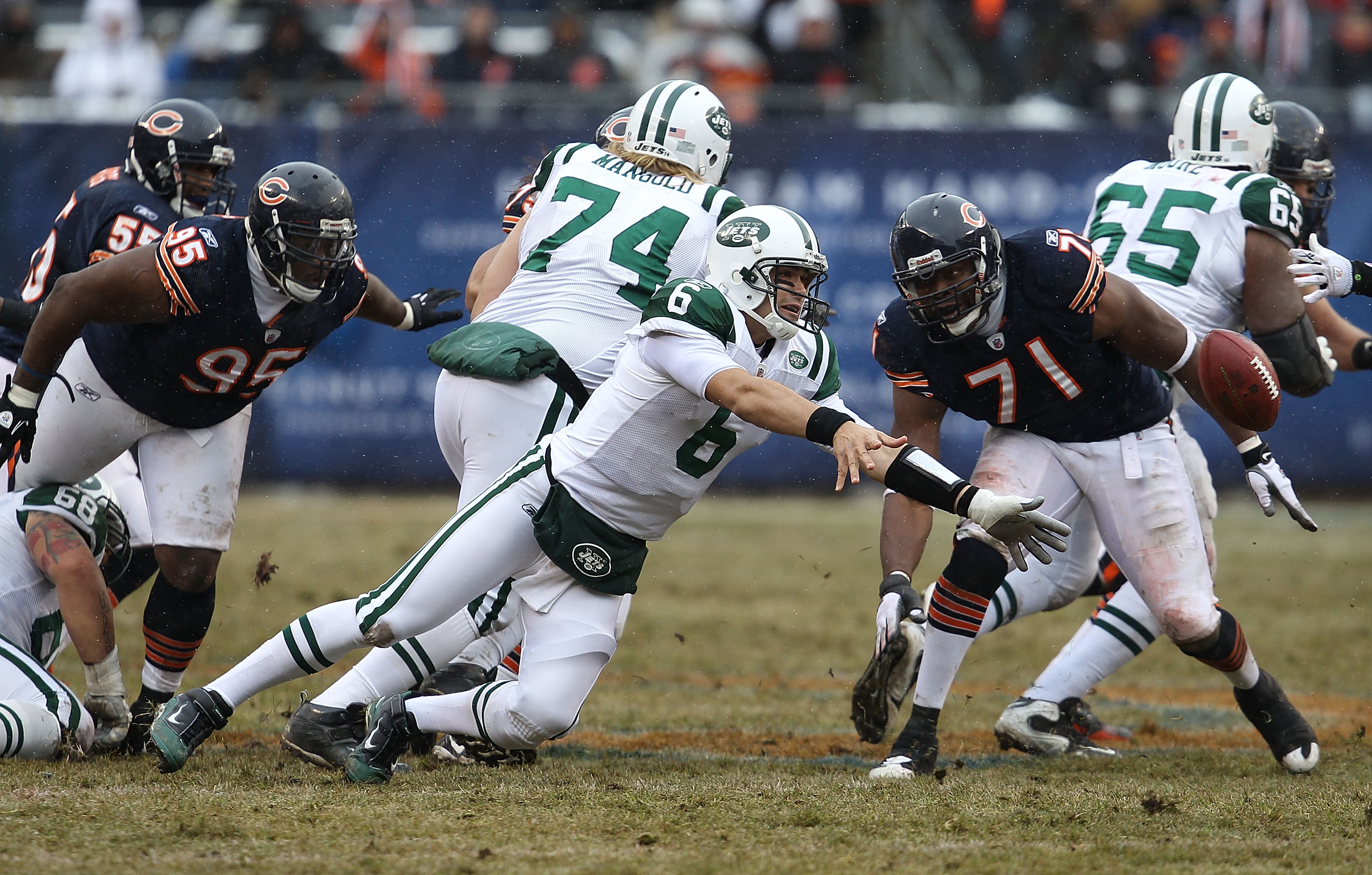 New York Jets quarterback Mark Sanchez rolls out of the pocket in the first  quarter against the Buffalo Bills in week 6 of the NFL season at Giants  Stadium in East Rutherford