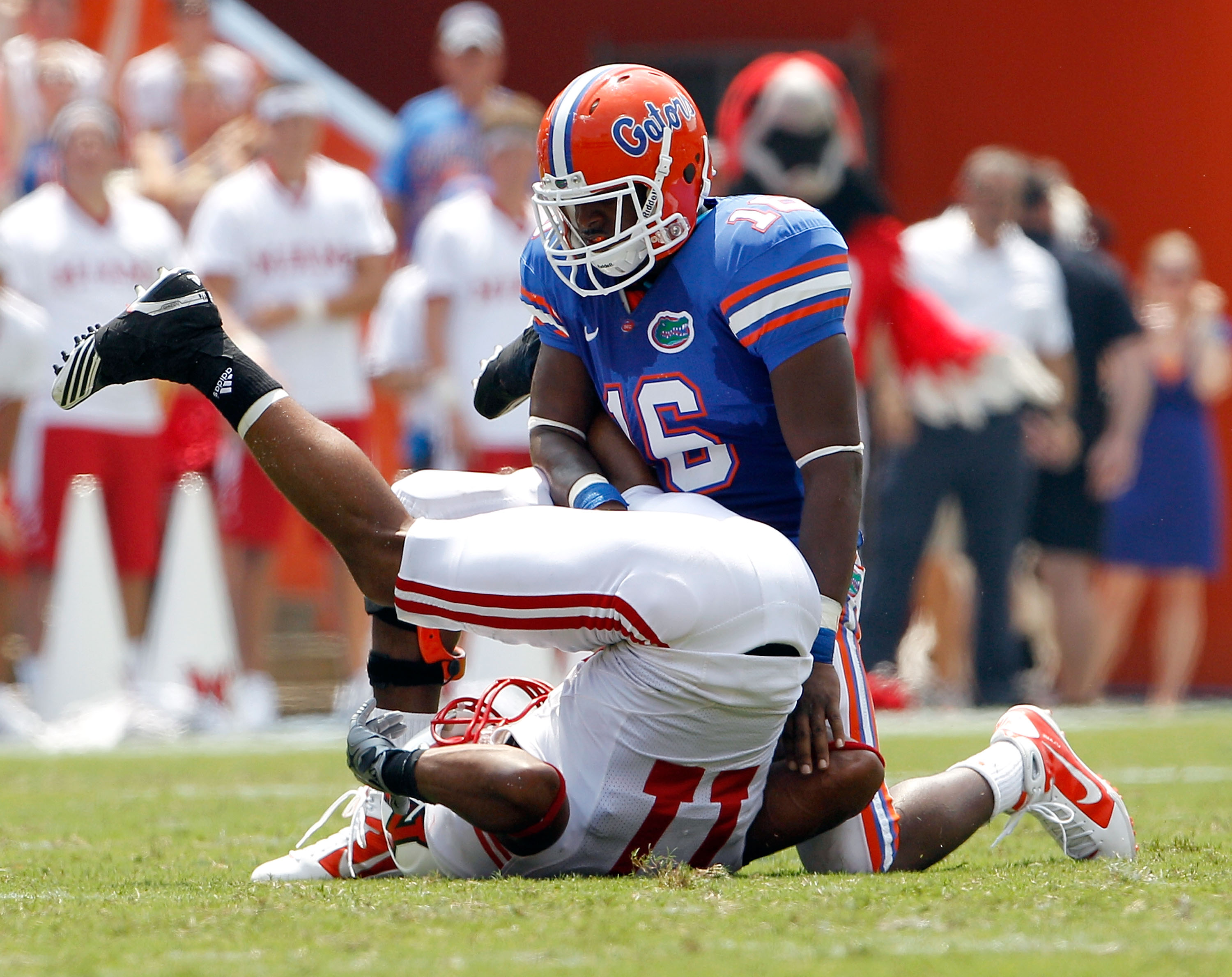 GAINESVILLE, FL - SEPTEMBER 04: A.J. Jones #16 of the Florida Gators breaks up a pass to Armand Robinson #11 of the Miami University RedHawks at Ben Hill Griffin Stadium on September 4, 2010 in Gainesville, Florida. (Photo by Sam Greenwood/Getty Images)