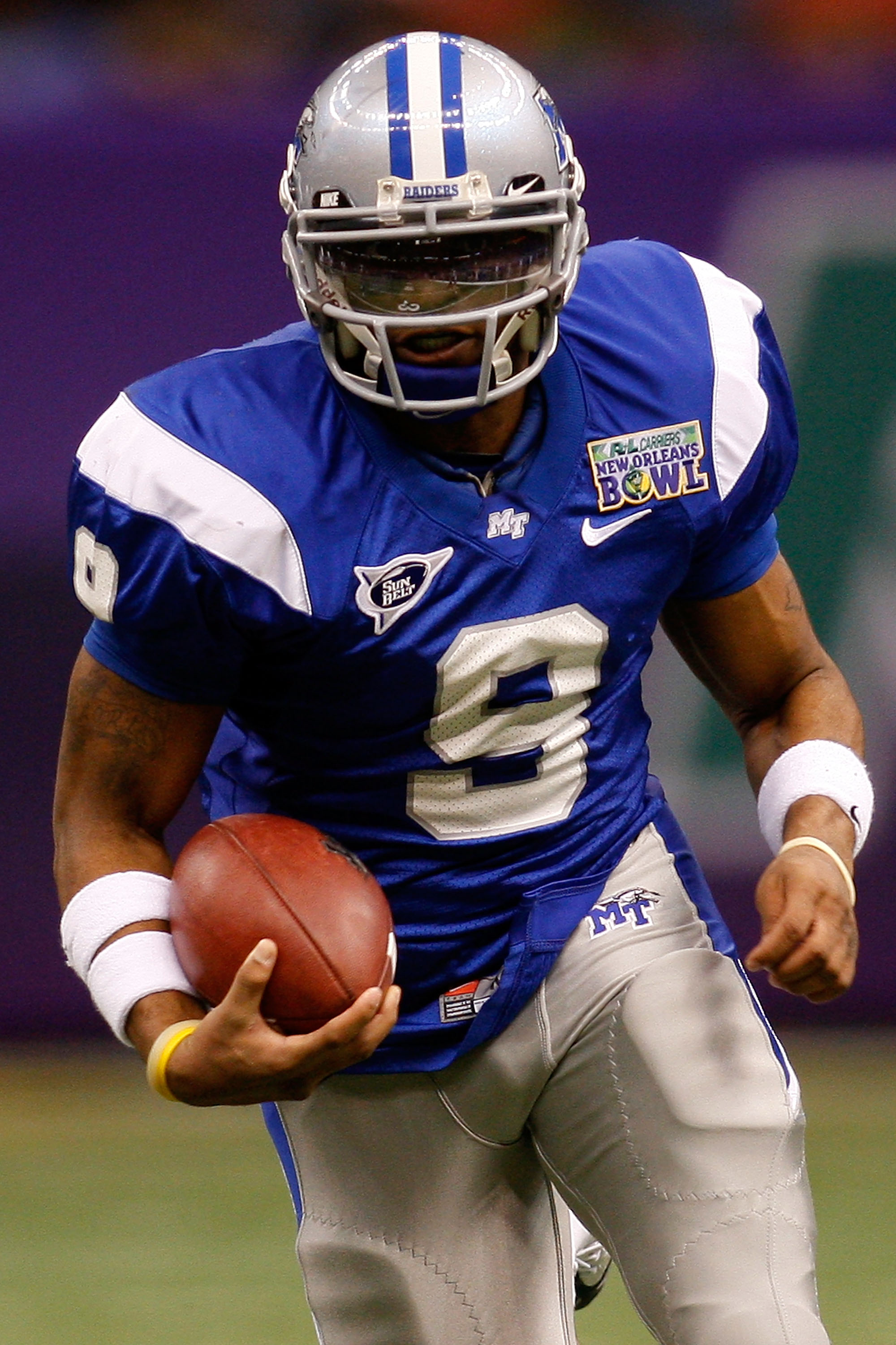 NEW ORLEANS - DECEMBER 20: Dwight Dasher #9 of the Middle Tennessee Blue Raiders runs against the Southern Miss Golden Eagles during the R+L Carriers New Orleans Bowl at the Louisiana Superdome on December 20, 2009 in New Orleans, Louisiana. The Blue Ra