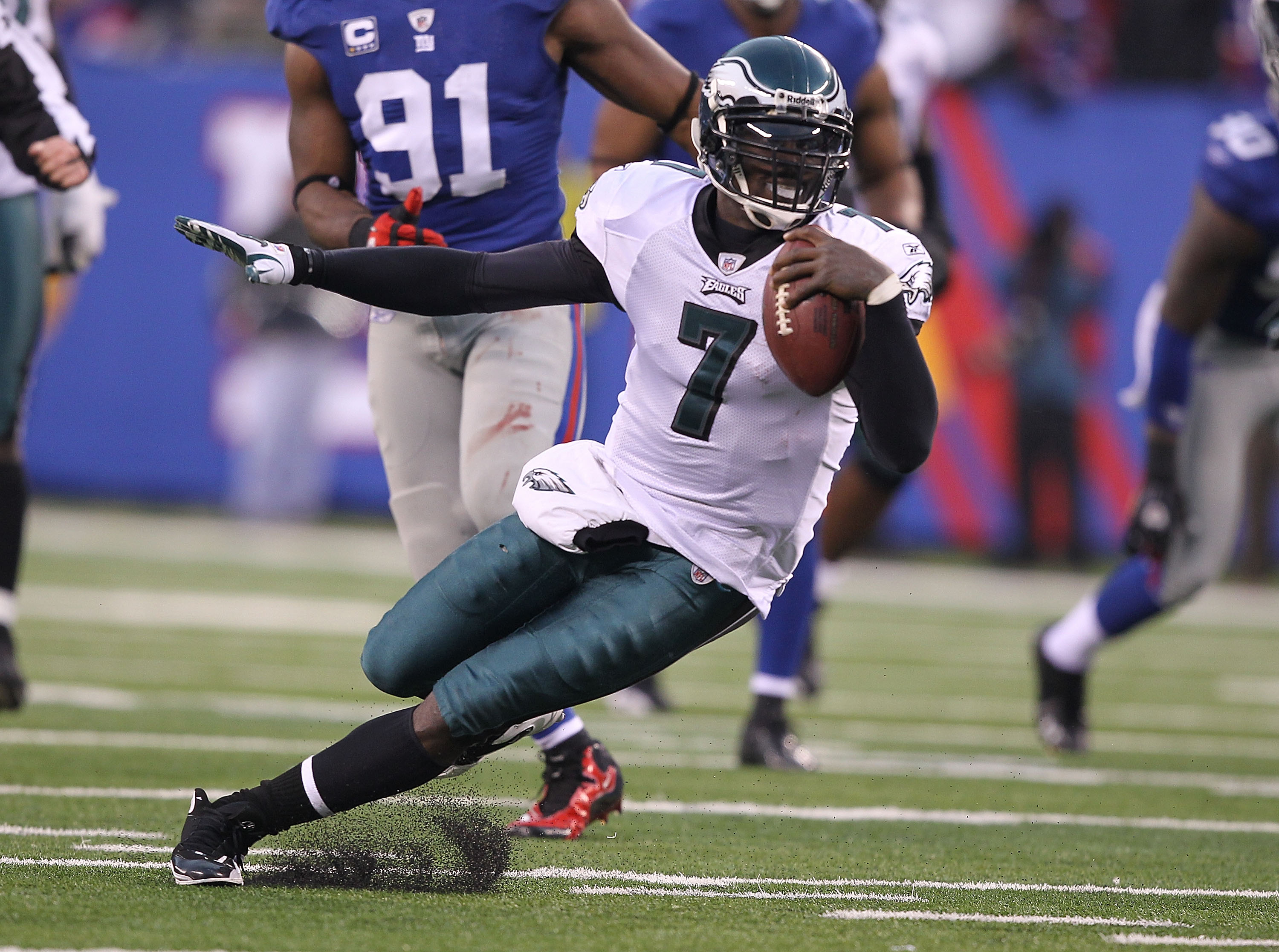 Philadelphia Eagles Michael Vick stands on the sidelines in the first  quarter against the New York Giants at New Meadowlands Stadium in week 15  of the NFL in East Rutherford, New Jersey