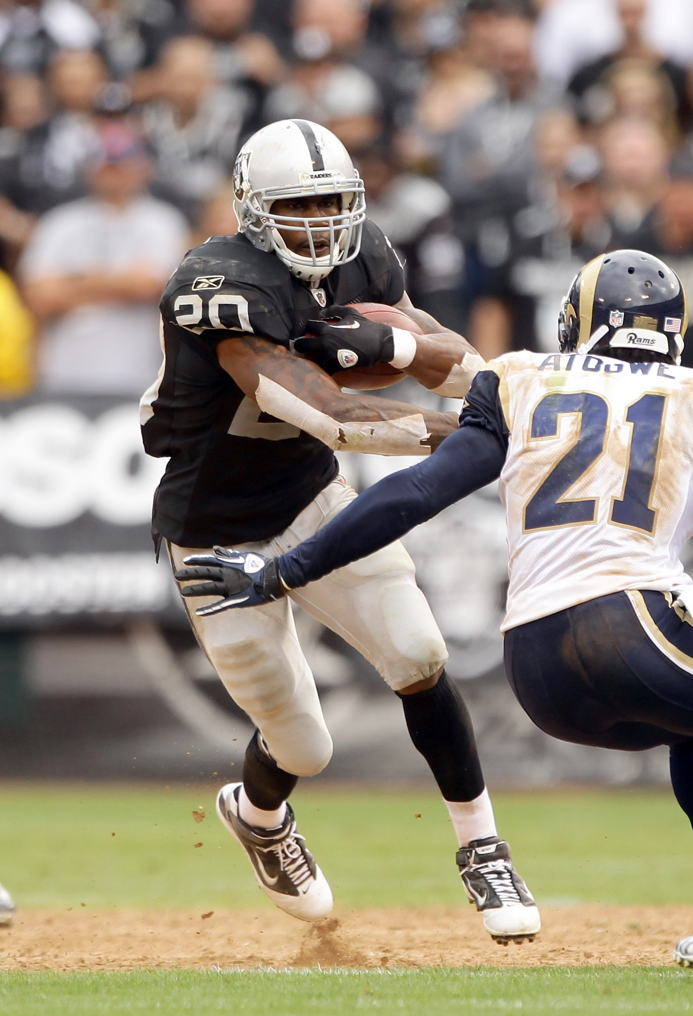 Oakland, California, USA. 6th Dec, 2012. Oakland Raiders running back Darren  McFadden (20) celebrates touchdown in black hole on Thursday at O.co  Coliseum in Oakland, CA. The Broncos defeated the Raiders 26-13.